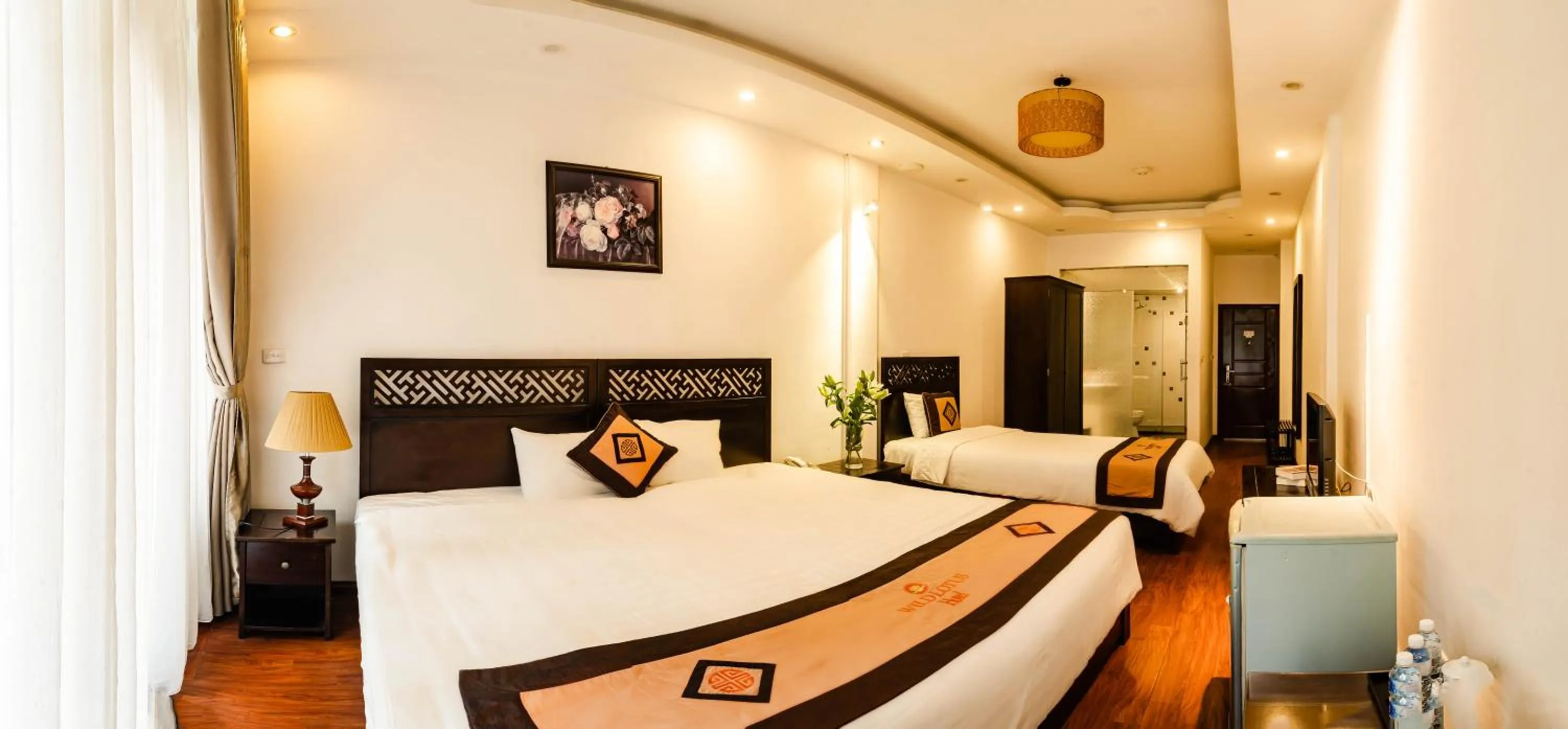 Bed in Wild Lotus Hotel & Travel 2