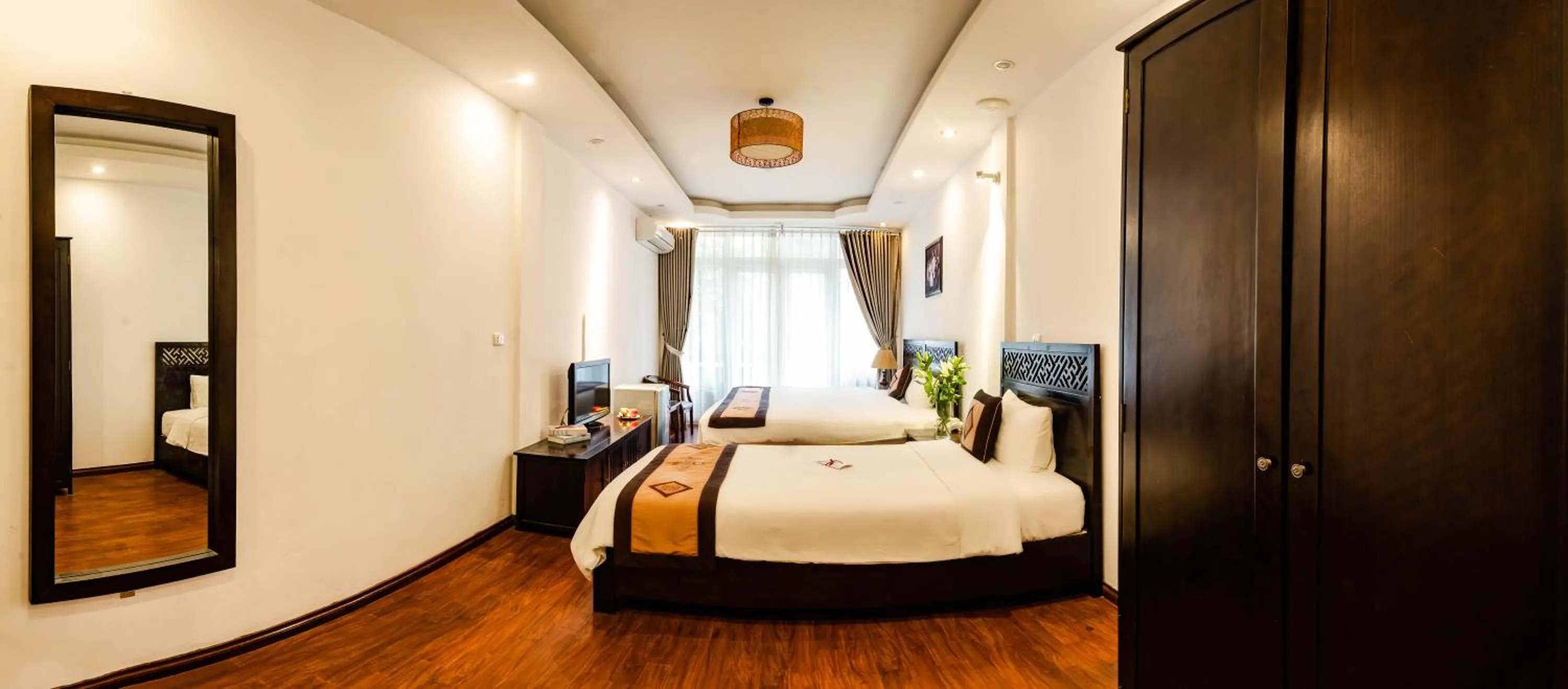 Bed in Wild Lotus Hotel & Travel 2