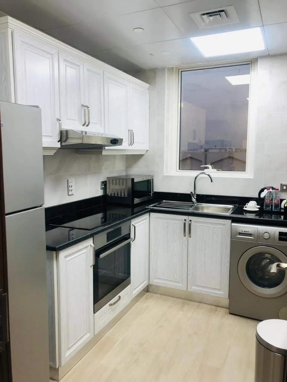Kitchen or kitchenette in BANIYAS PLAZA HOTEL APARTMENTS