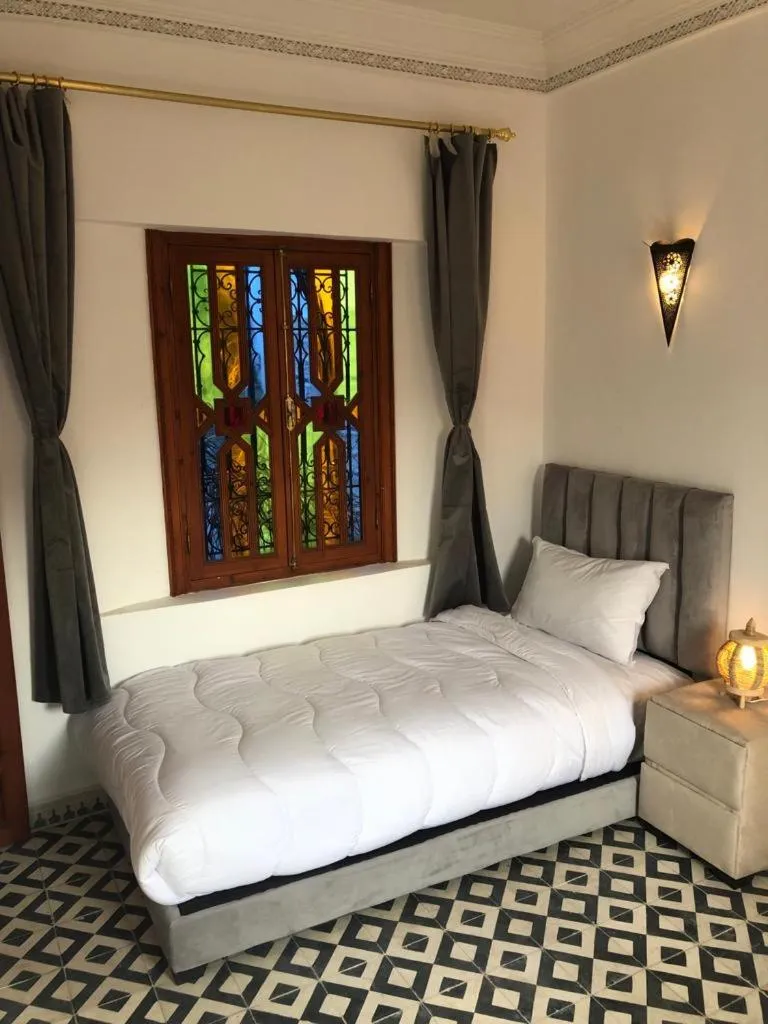 Bed in Riad Amely