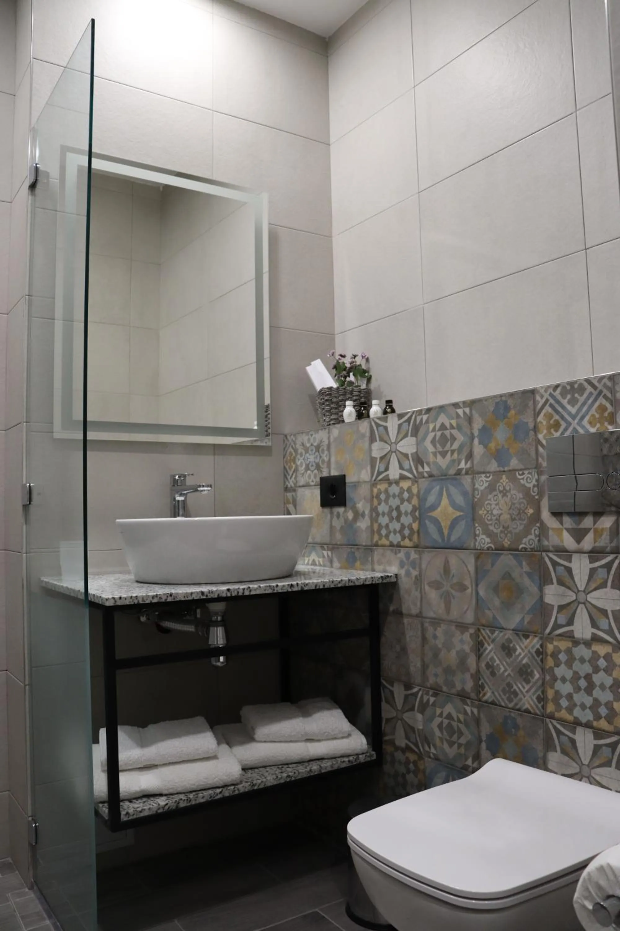 Toilet in Orion ApartHotel