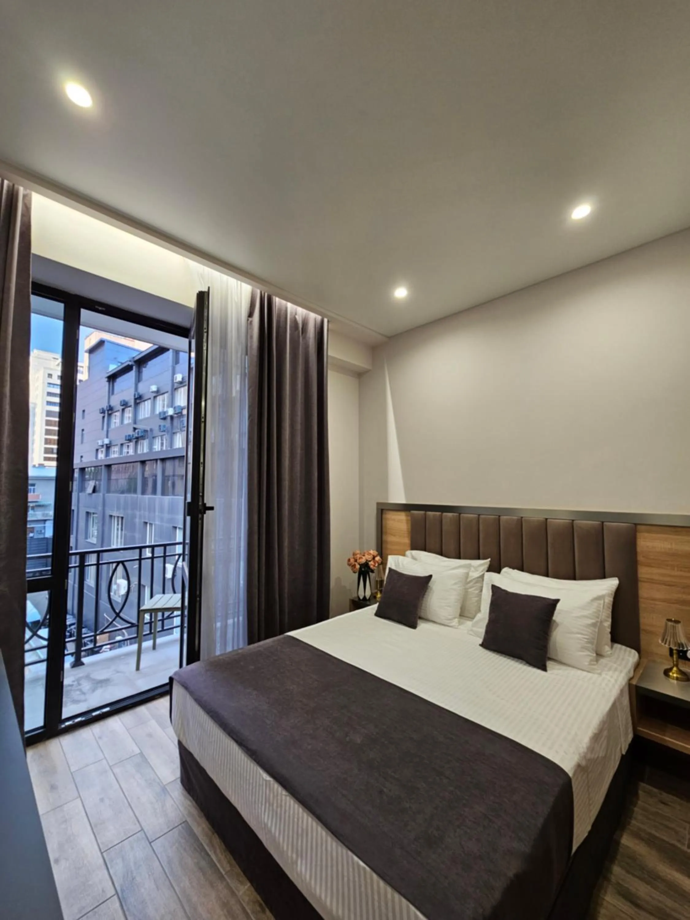 Bed in Orion ApartHotel