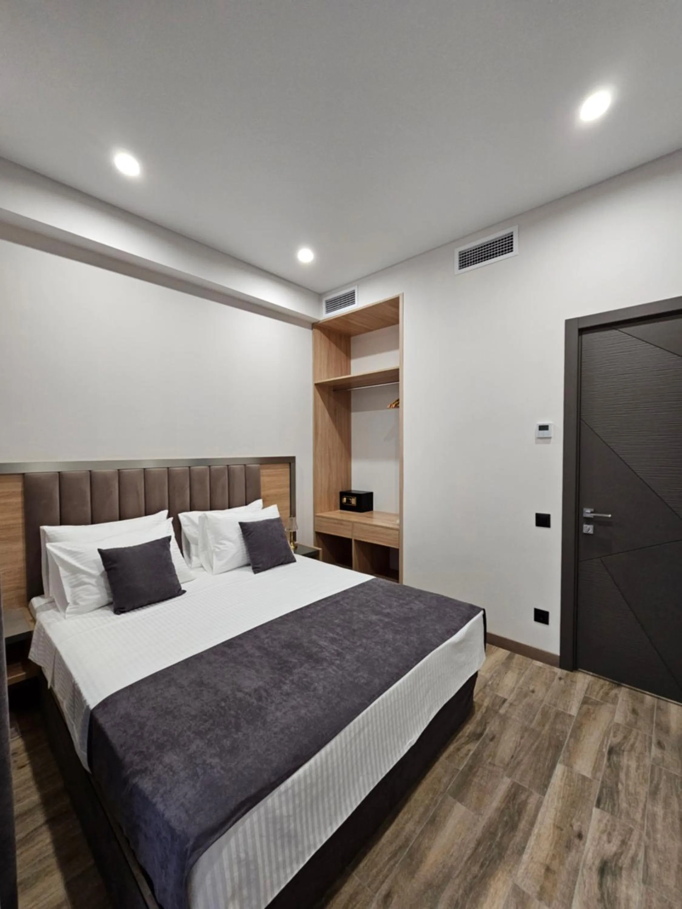 Bed in Orion ApartHotel