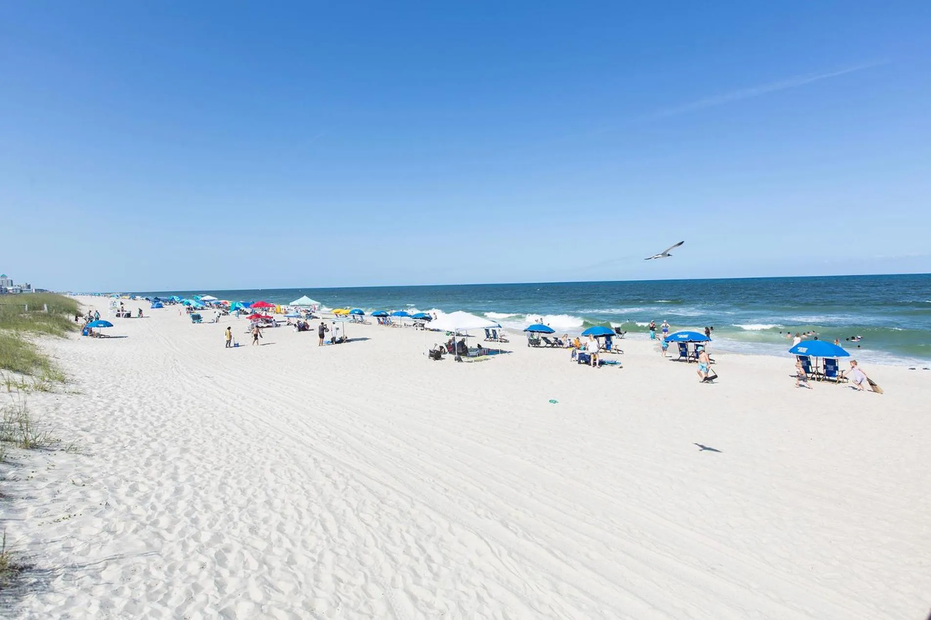 People in Golden Sands Carolina Beach Oceanfront, Tapestry by Hilton