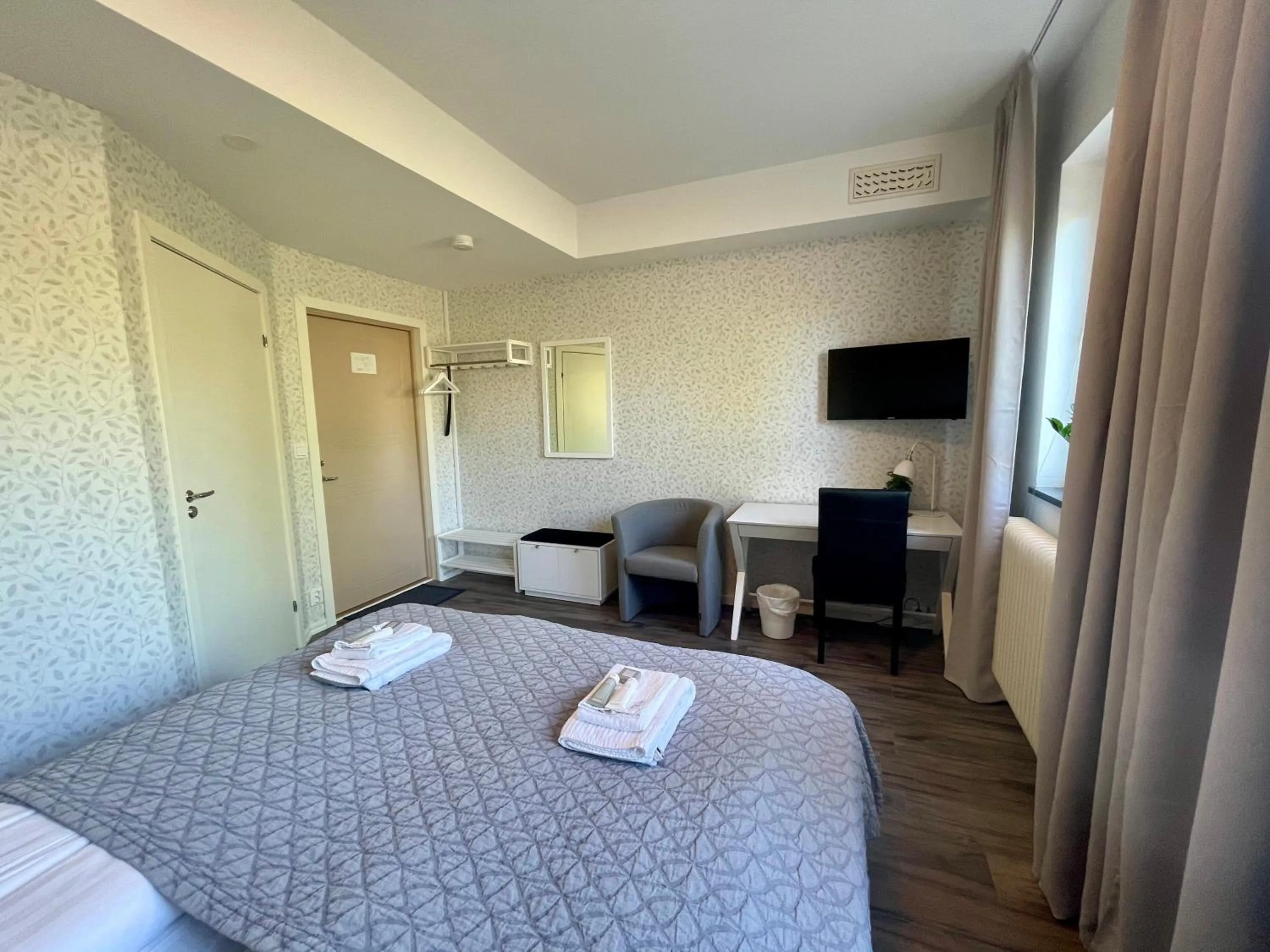 Photo of the whole room, Bed in Hotell Luspen