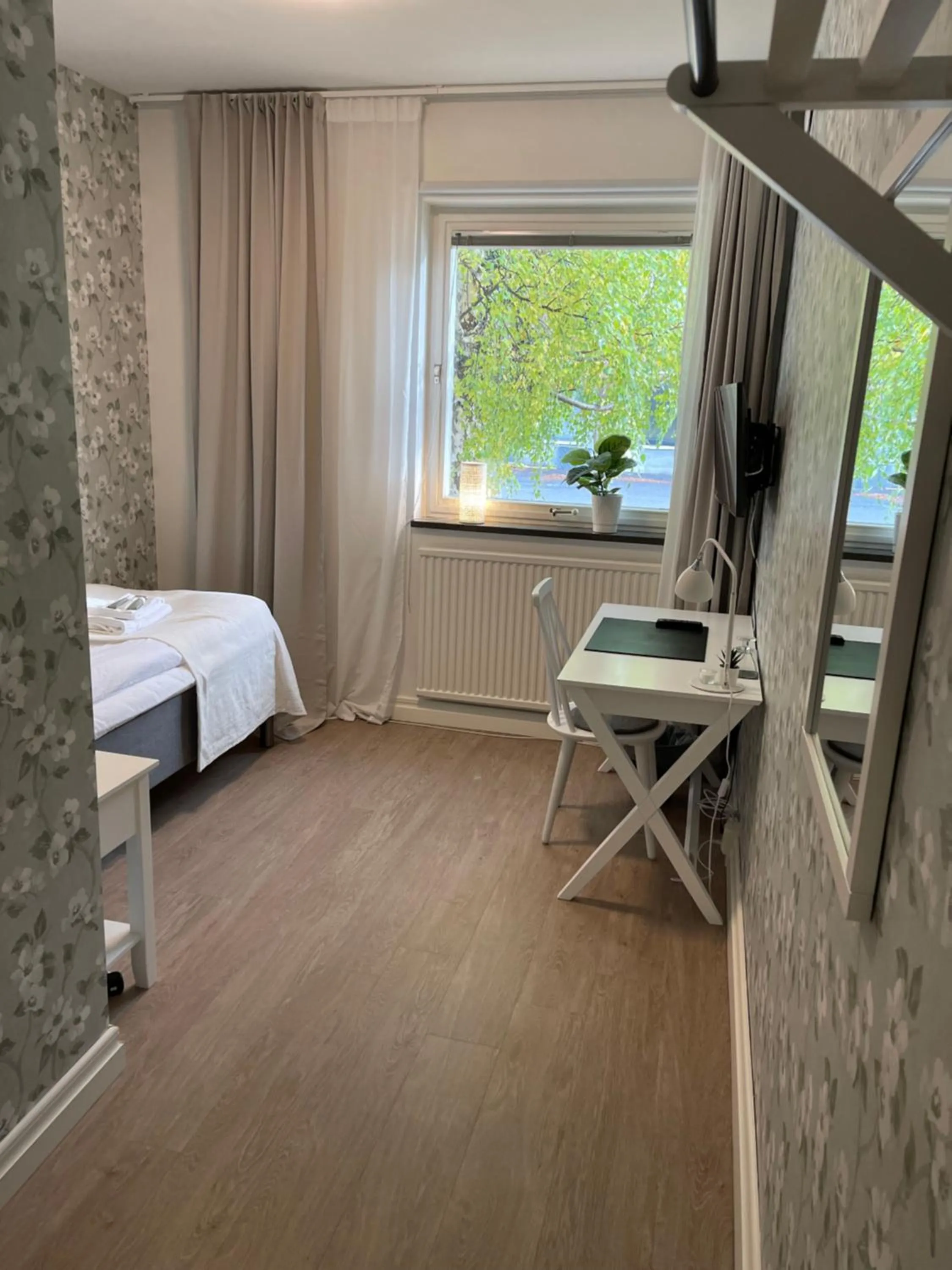 Photo of the whole room, Bed in Hotell Luspen