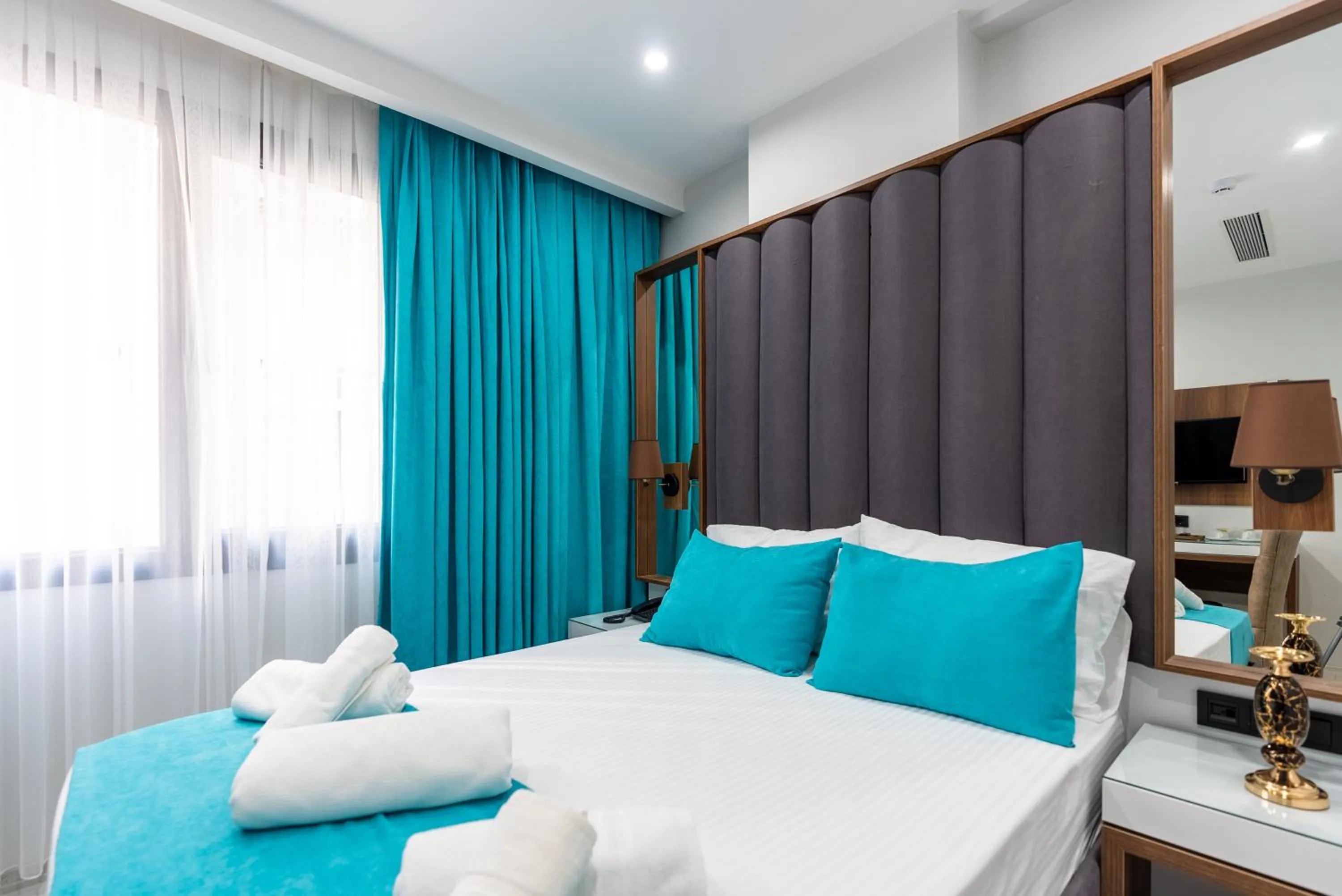 Bed in WP White Palace Hotel