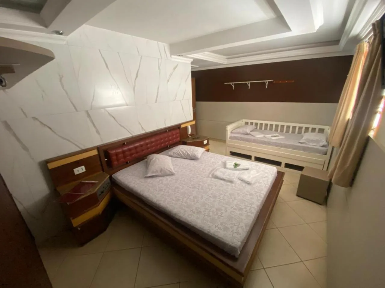 Photo of the whole room, Bed in Namorata Expo Inn