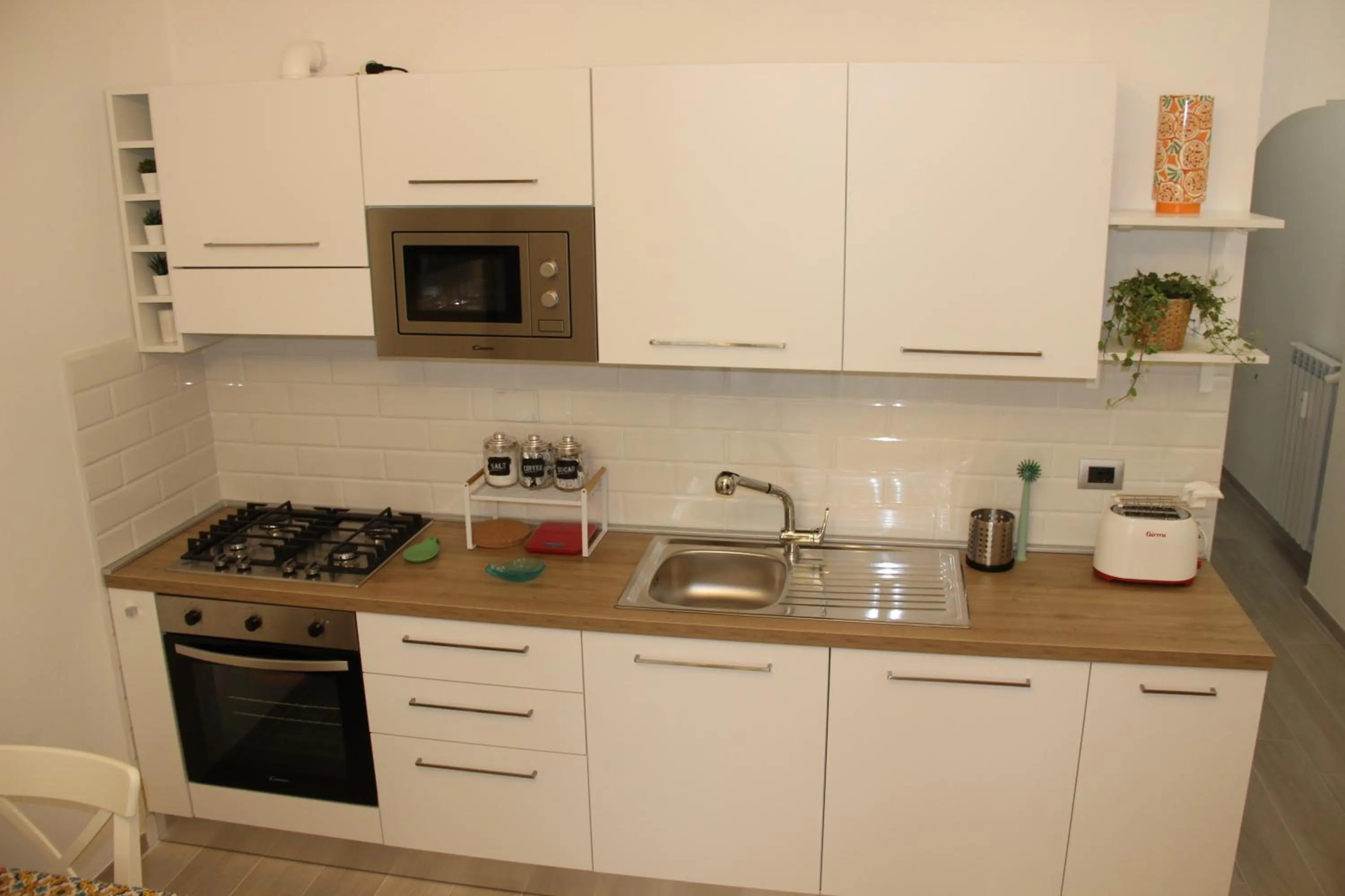 Kitchen or kitchenette in Appartamento Lungomare Toscanelli