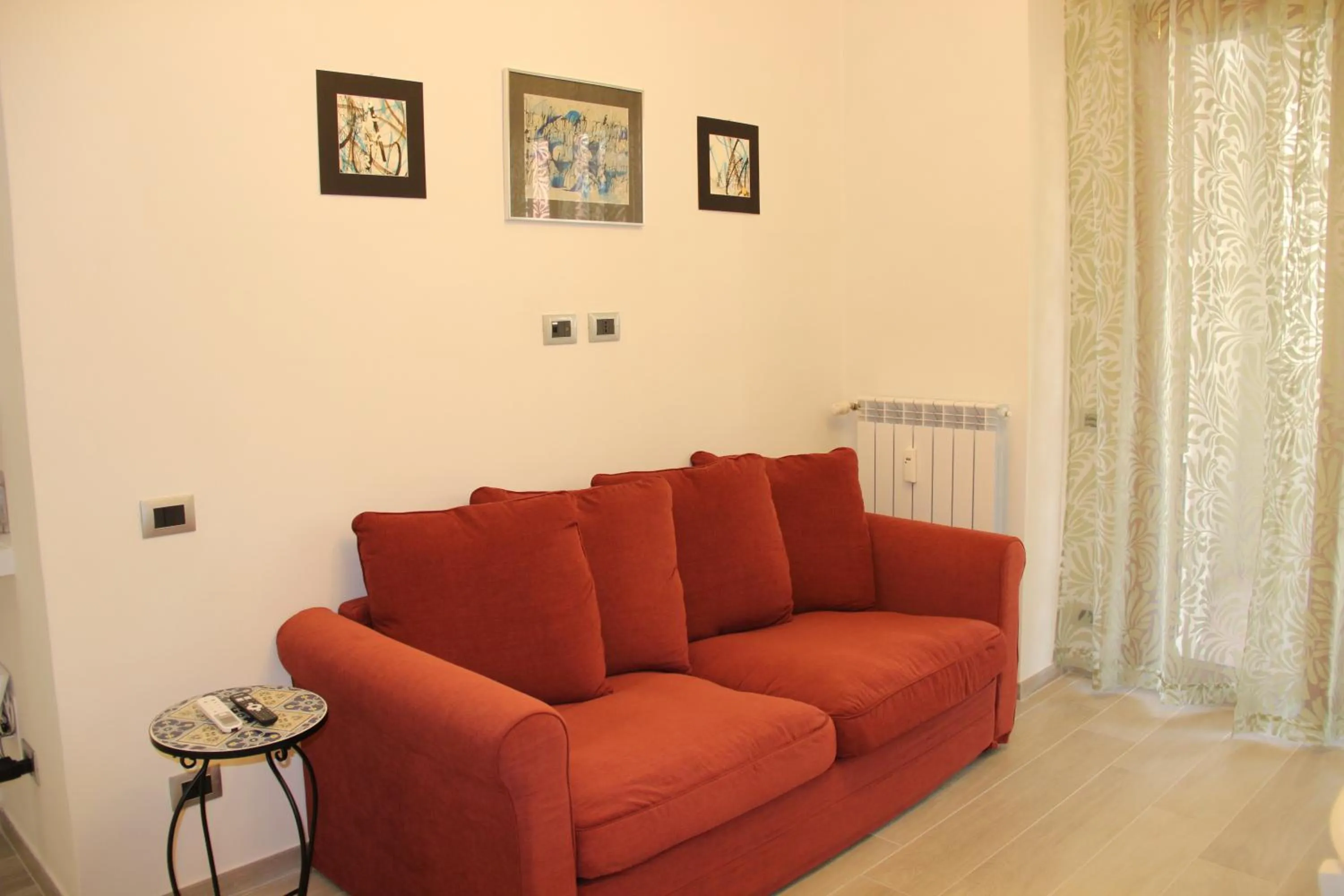 Communal lounge/ TV room in Appartamento Lungomare Toscanelli