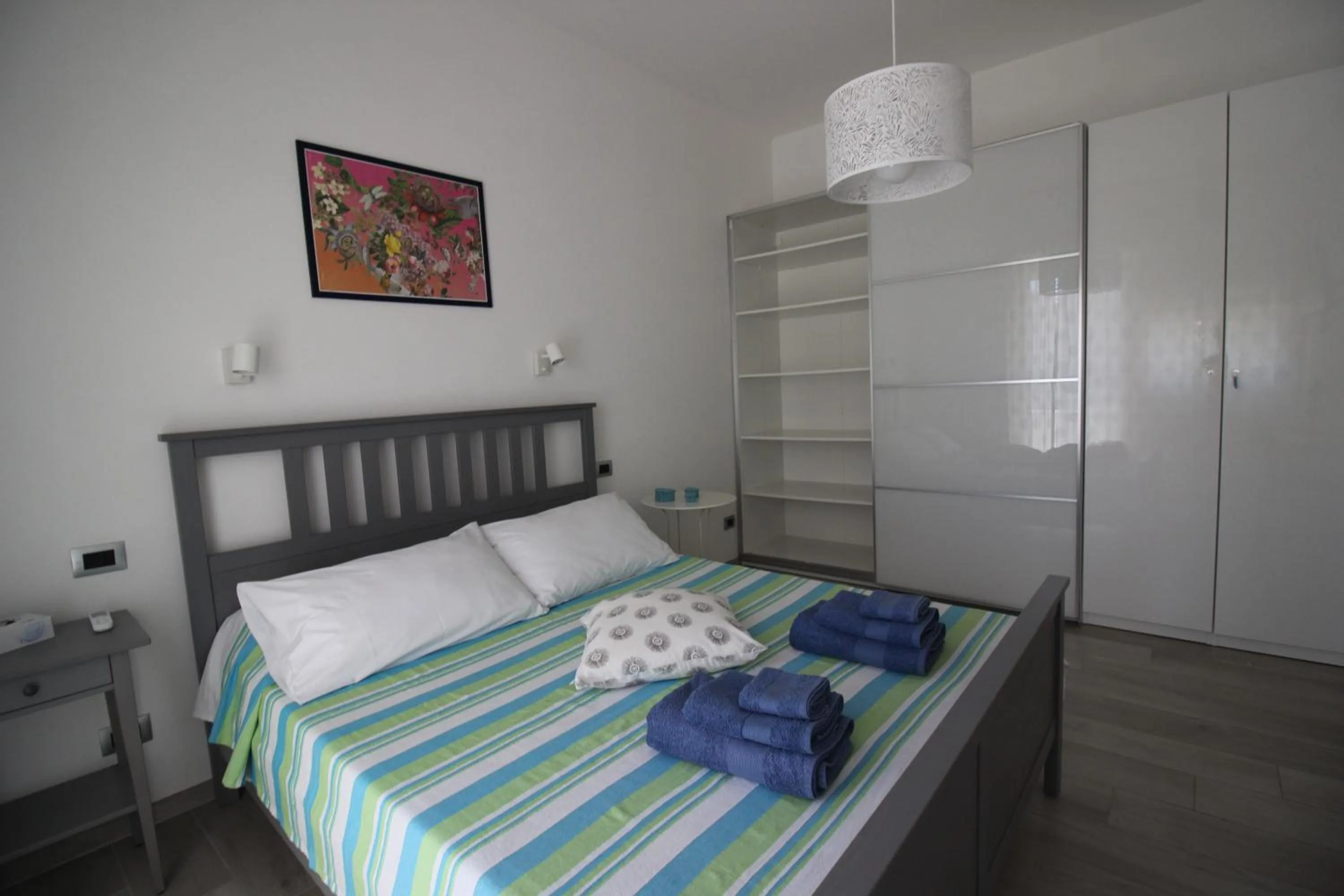 Bedroom, Bed in Appartamento Lungomare Toscanelli