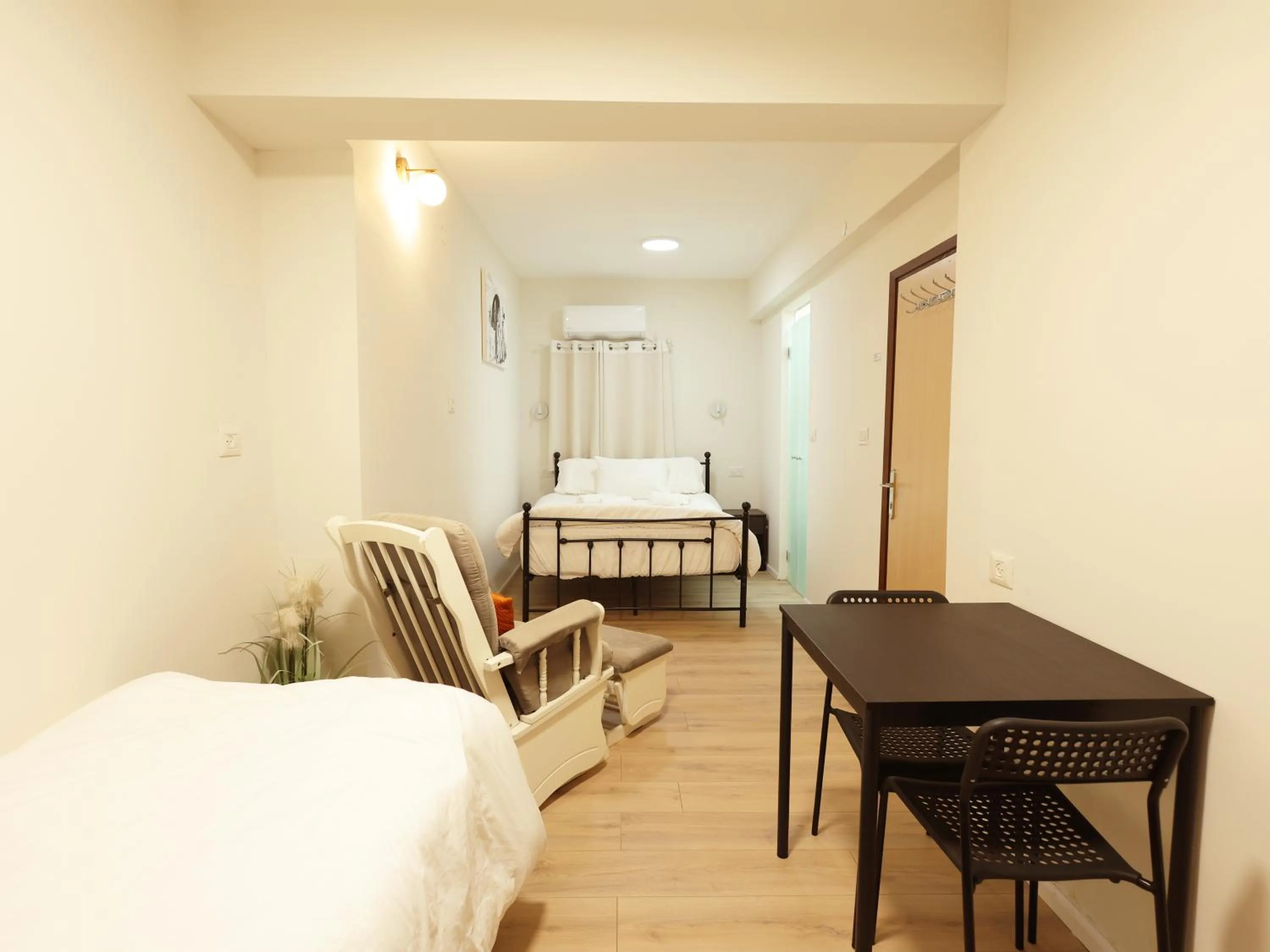 Bed in Mary's Well Apartments