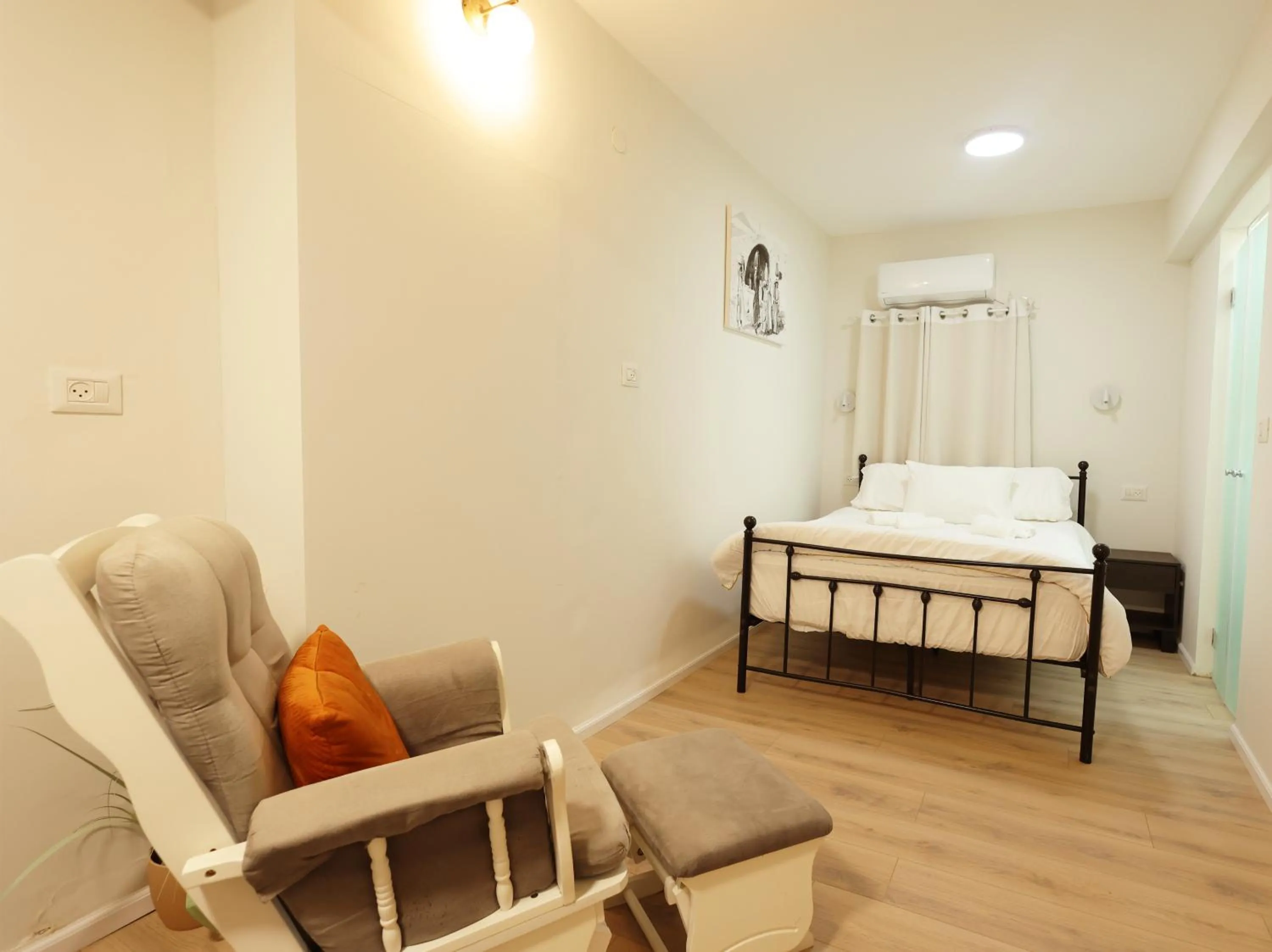 Bed in Mary's Well Apartments