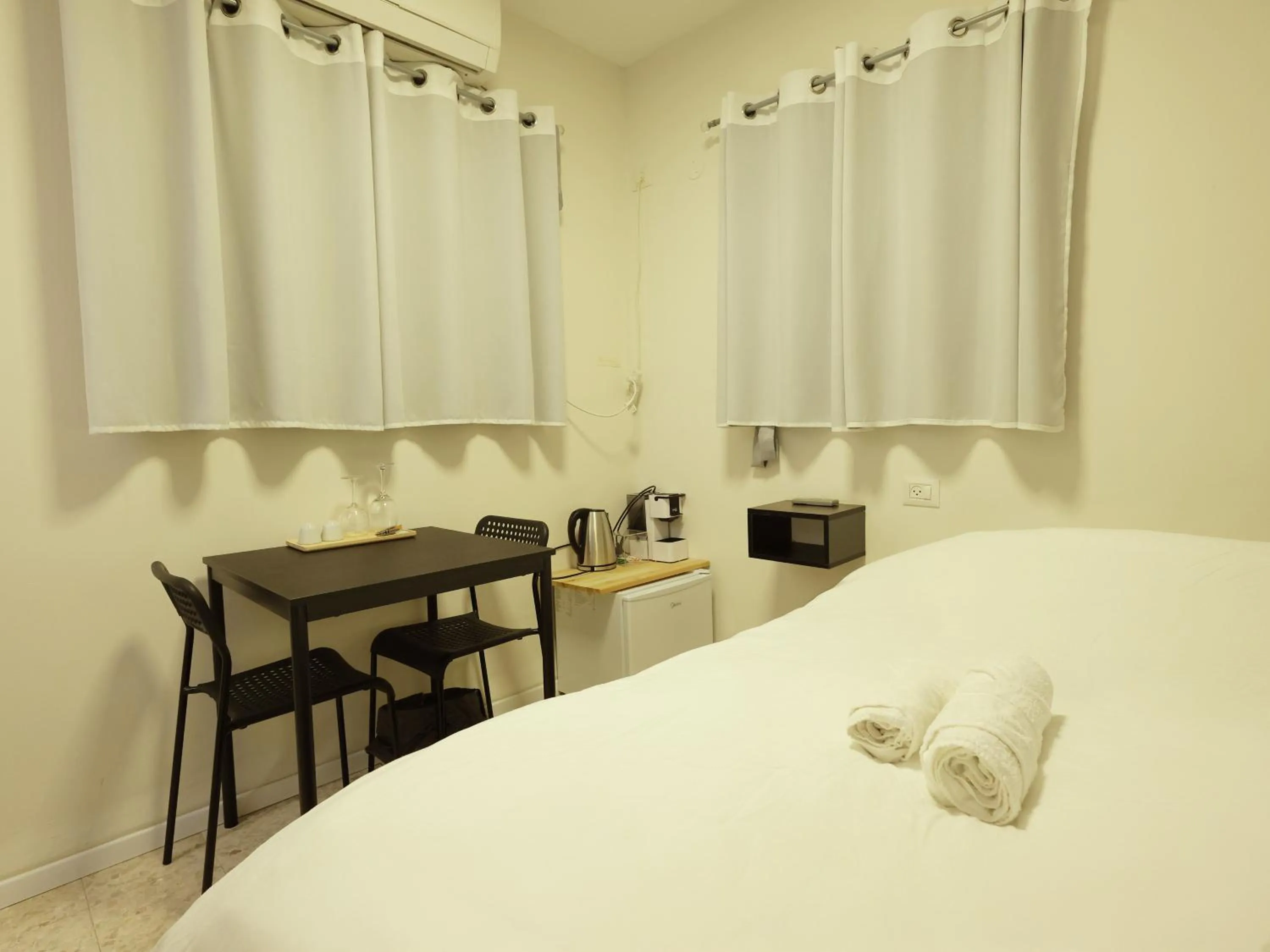 Bed in Mary's Well Apartments