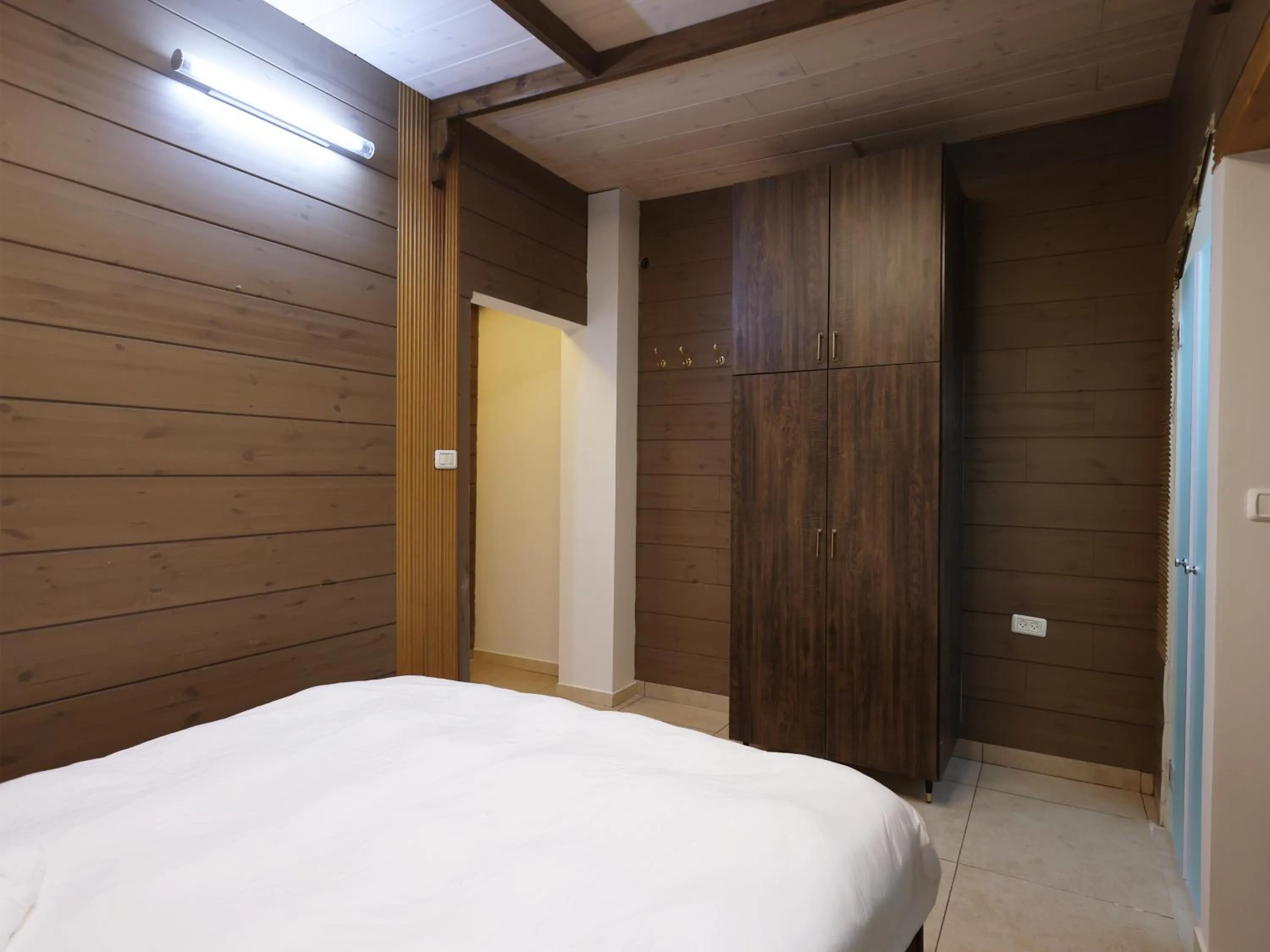 Bed in Mary's Well Apartments