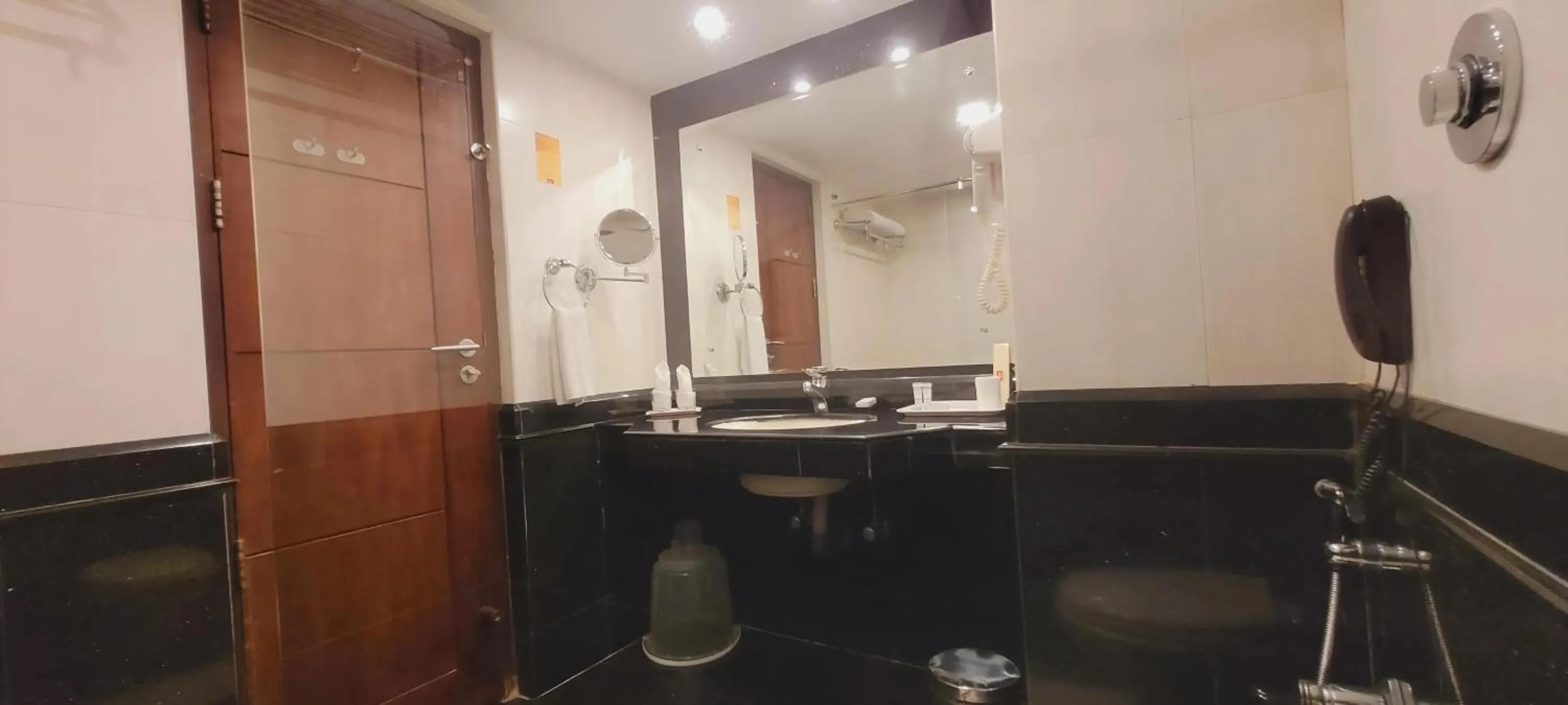 Bathroom in ASHOKA INN