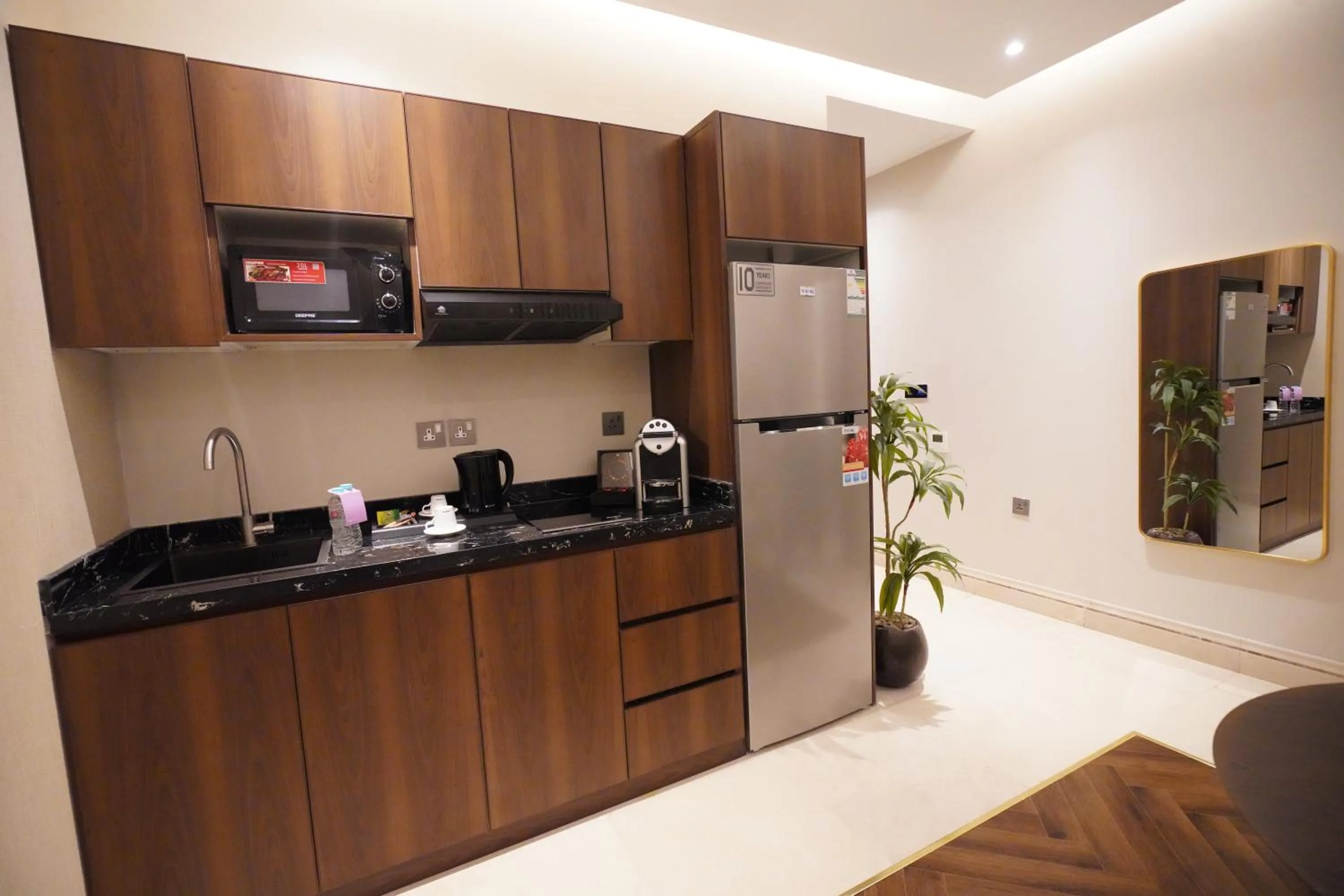Kitchen or kitchenette in Tura Residence Olaya - ترى للشقق المخدومة العليا