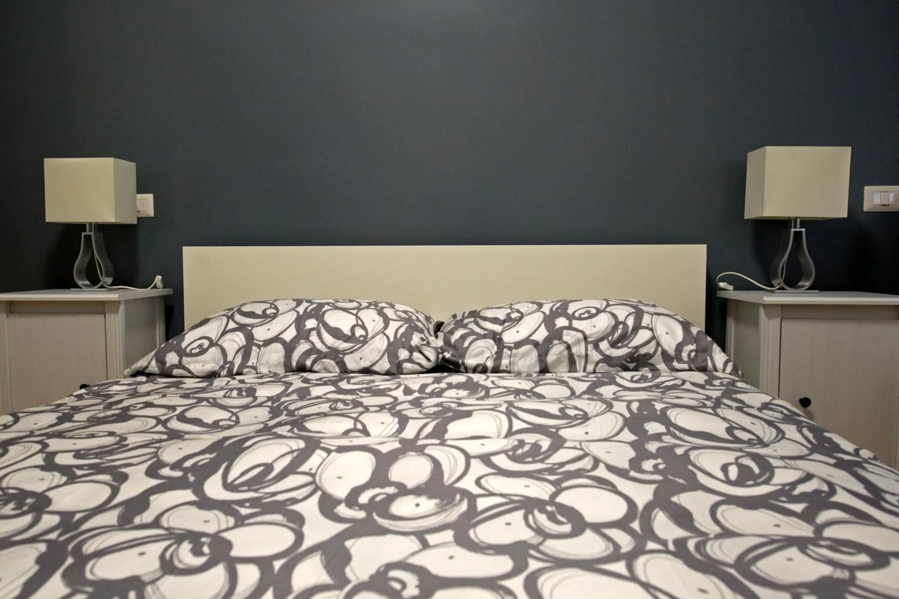 Bed in The Photos Room B&B