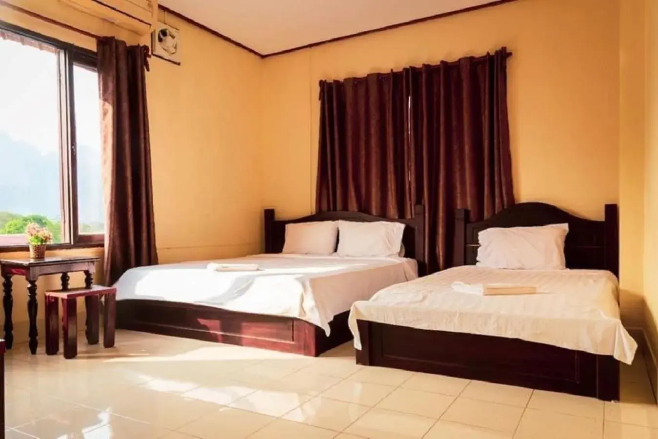 Triple Room with Mountain View in DokPhut Guesthouse Triple Room with Mountain View in DokPhut Guesthouse