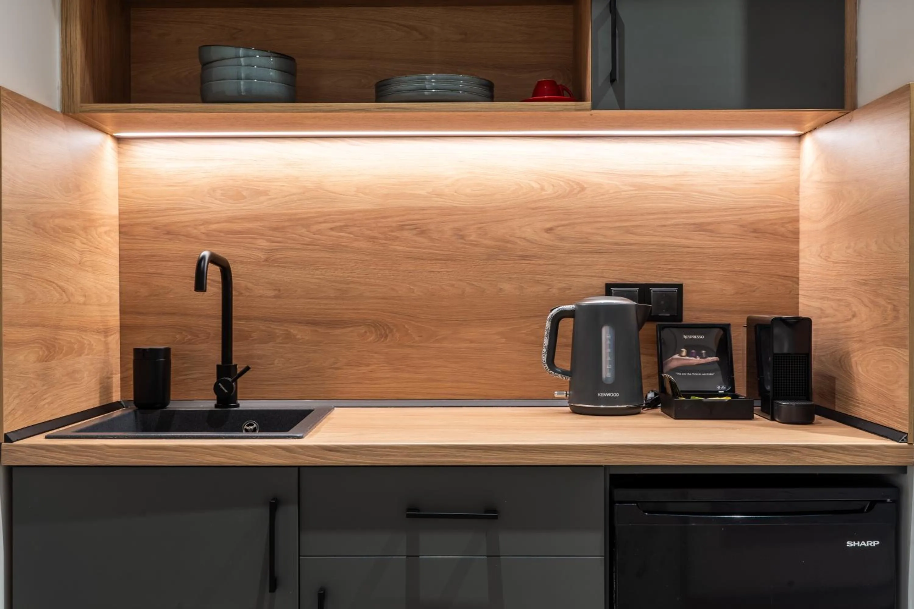 Kitchen or kitchenette in NERO SEASCAPE SUITES