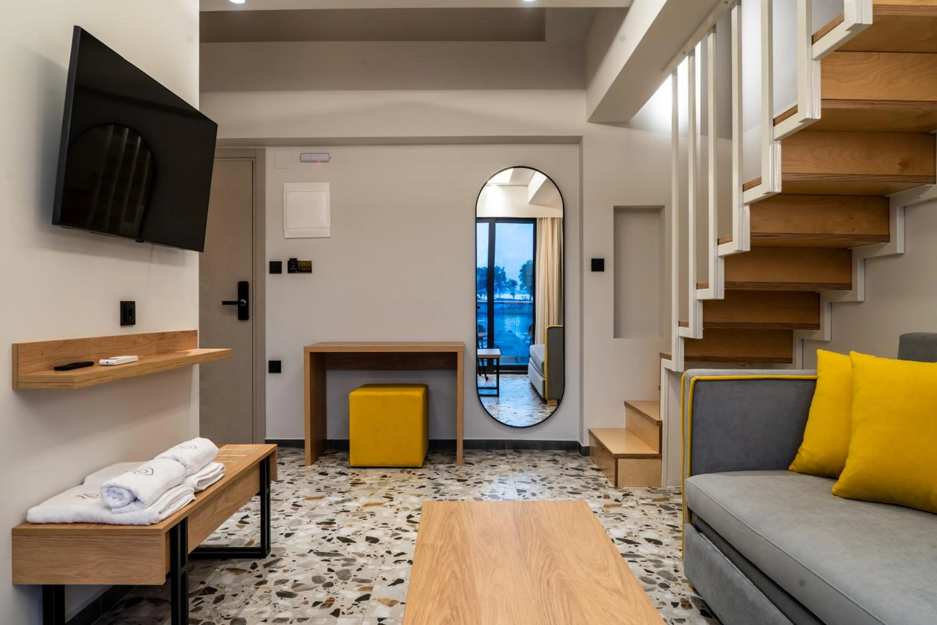 Bed in NERO SEASCAPE SUITES