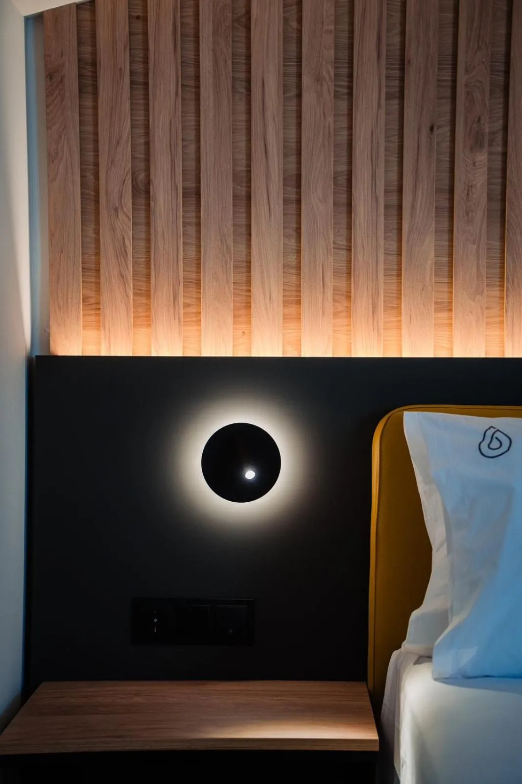 Bed in NERO SEASCAPE SUITES