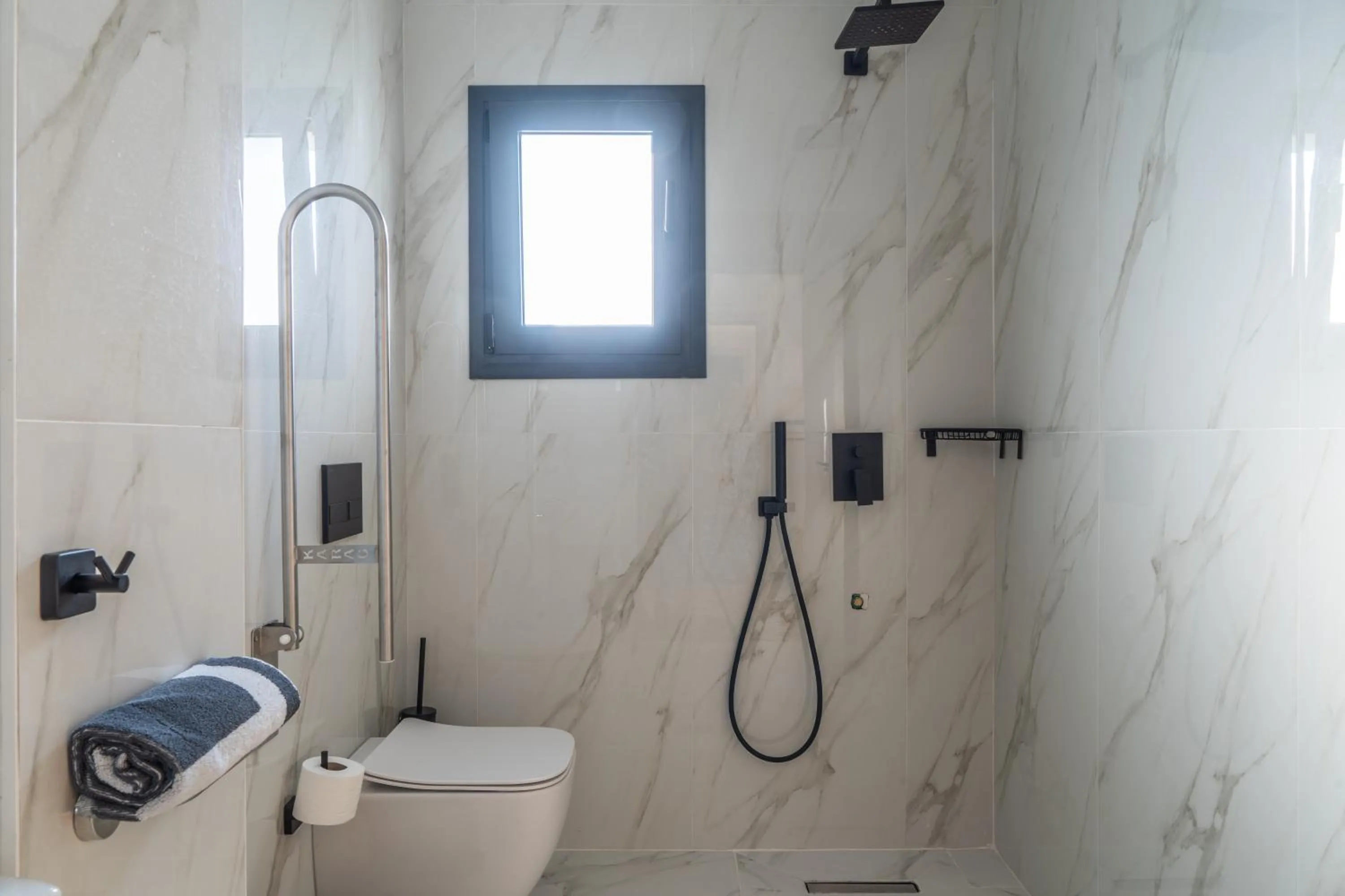 Shower in NERO SEASCAPE SUITES