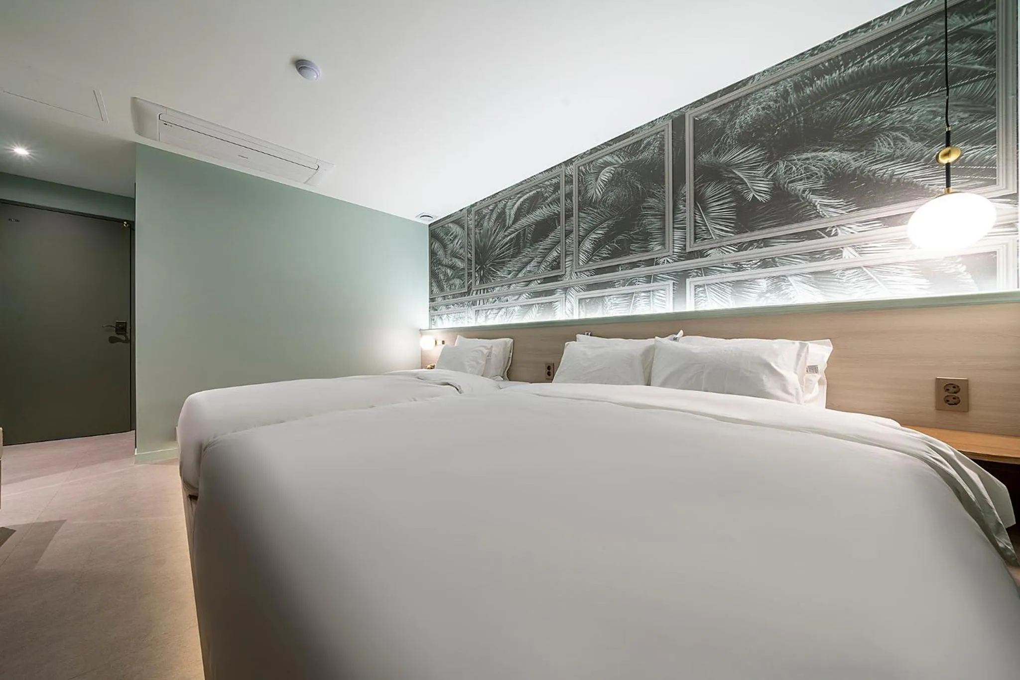 Bed in Wonju Hotel Ippda