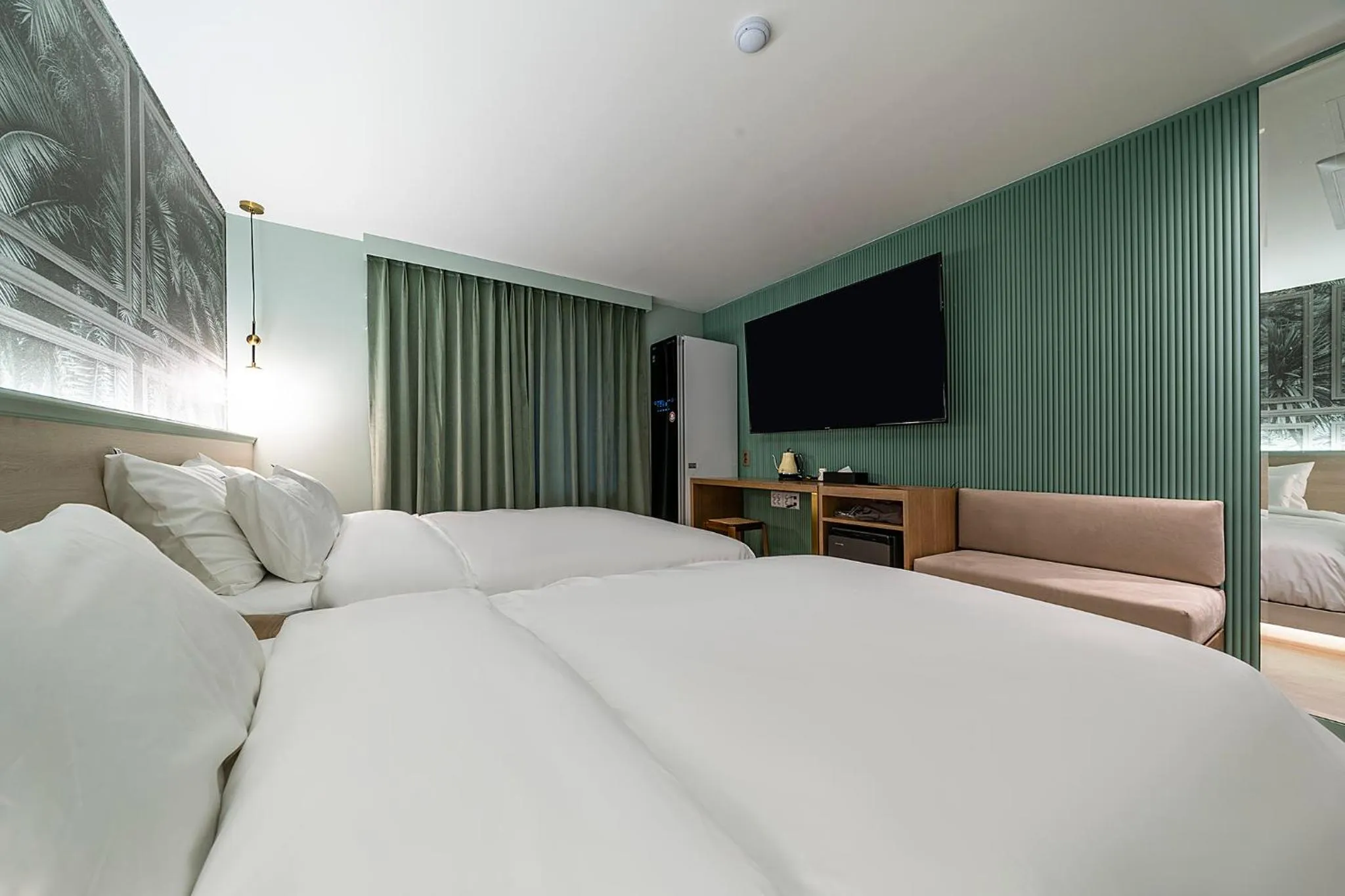 Bed in Wonju Hotel Ippda