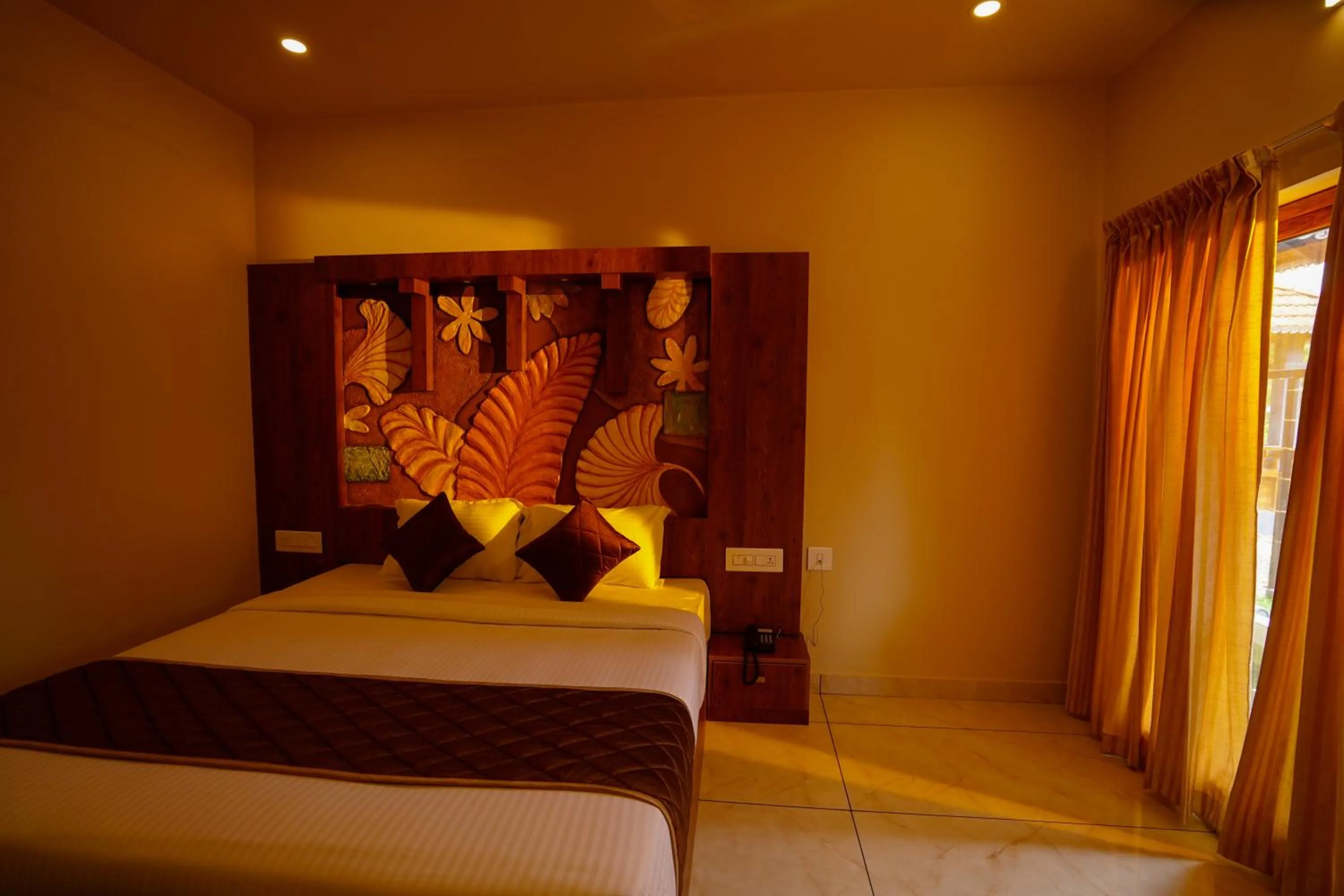 Bed in KOTTACKAL NATURE INN