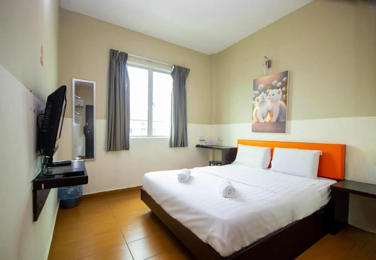 Bed in JQ Suria Hotel