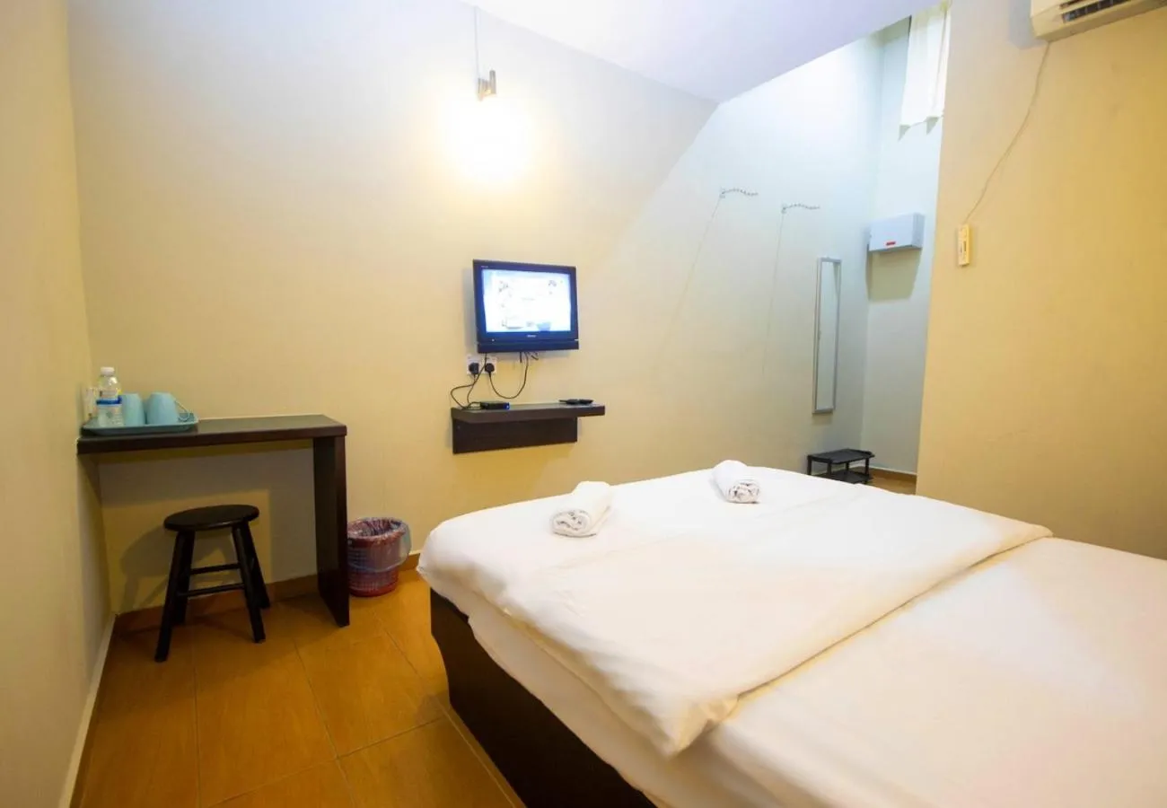 Bed in JQ Suria Hotel