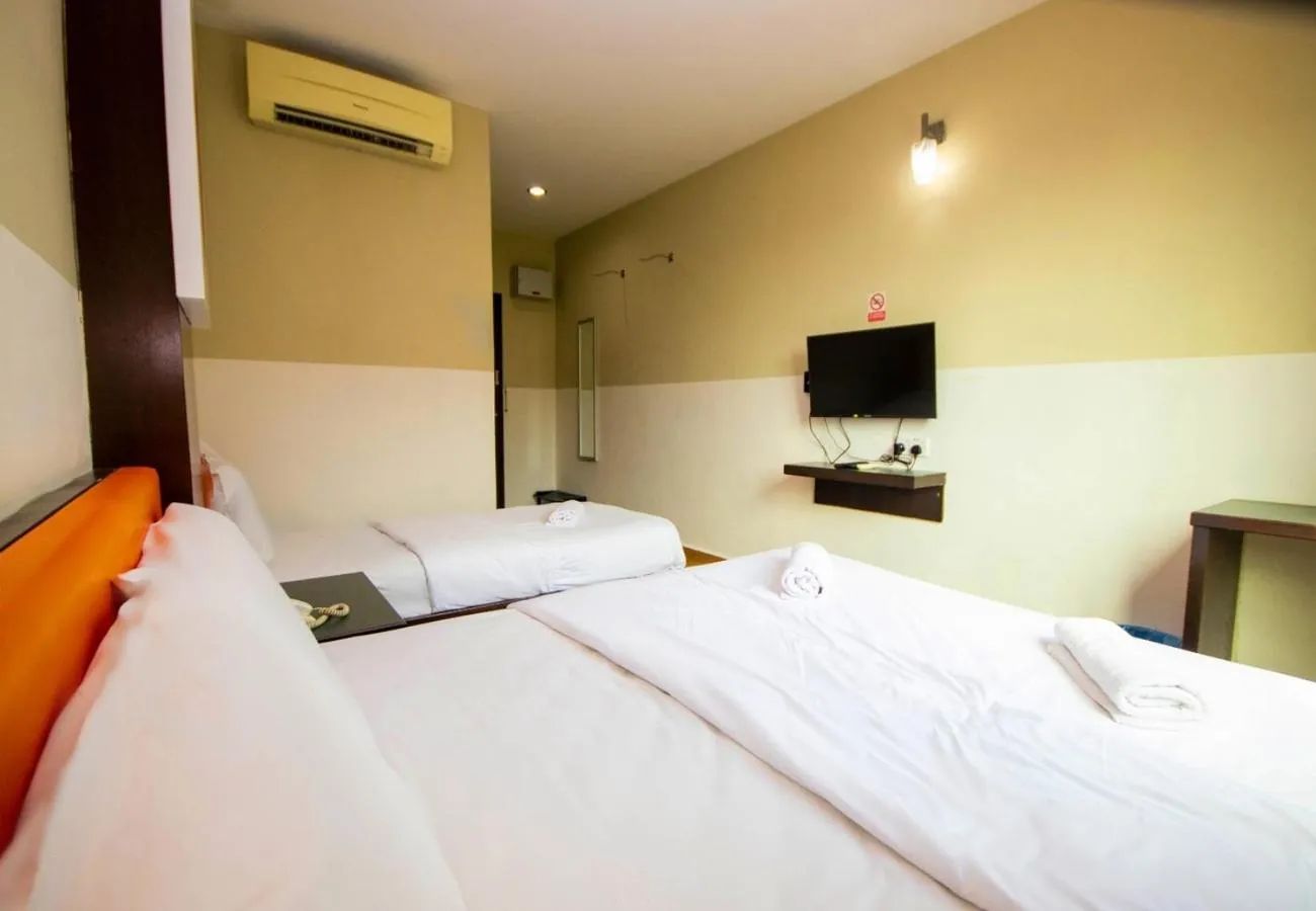 Bed in JQ Suria Hotel