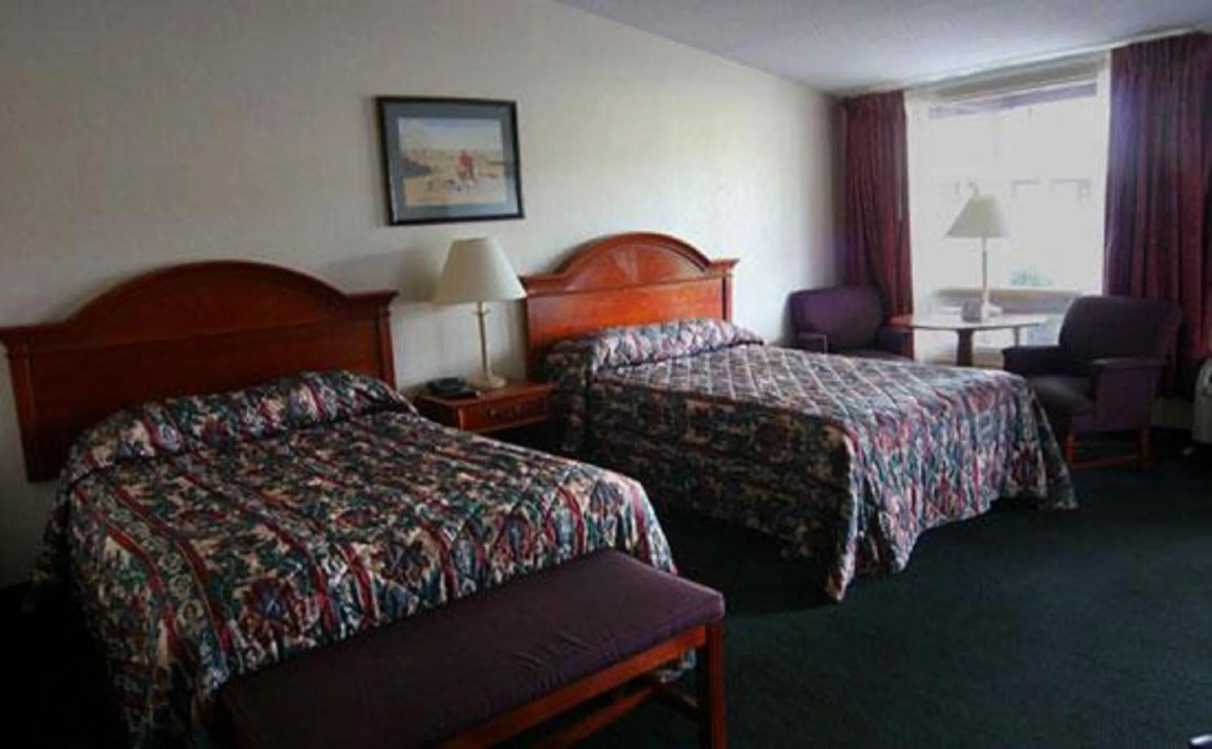 Bed in Landmark Motor Inn