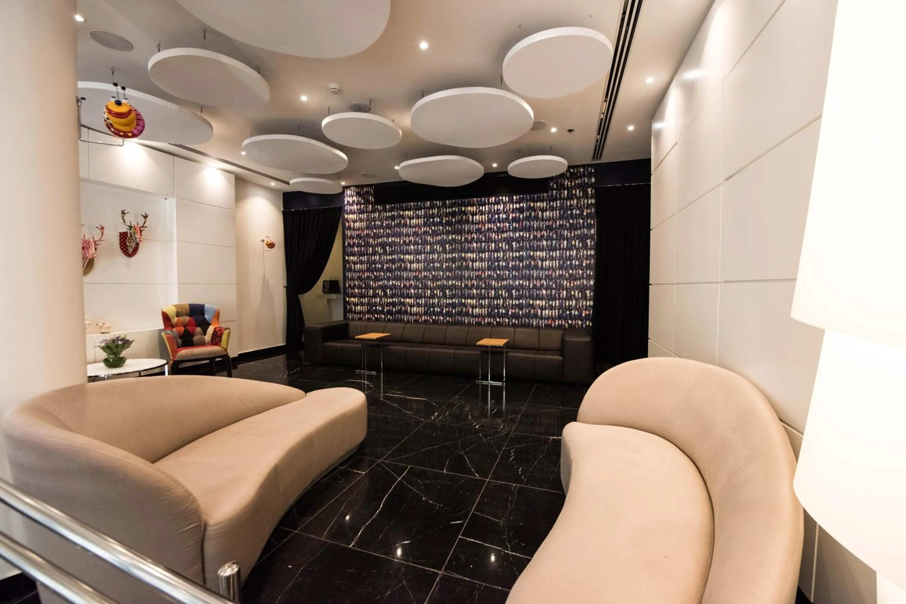 Seating area in Eyal Hotel by Smart Hotels