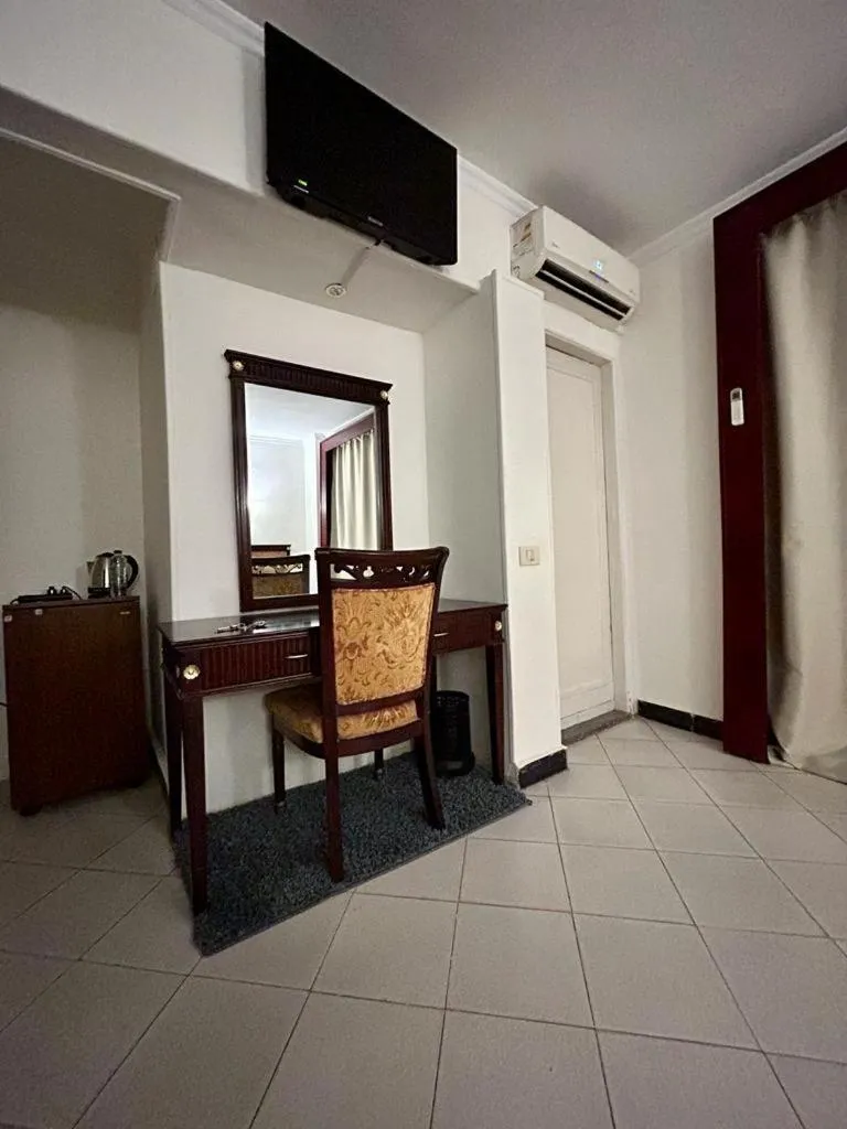 TV and multimedia in The New Garden Palace Hotel