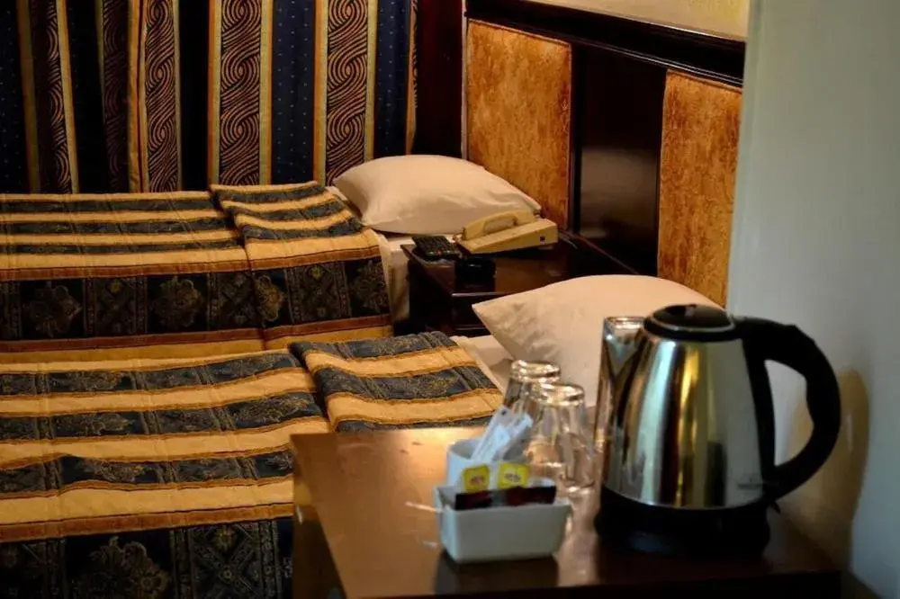 Standard Single Room - single occupancy in The New Garden Palace Hotel Standard Single Room - single occupancy in The New Garden Palace Hotel