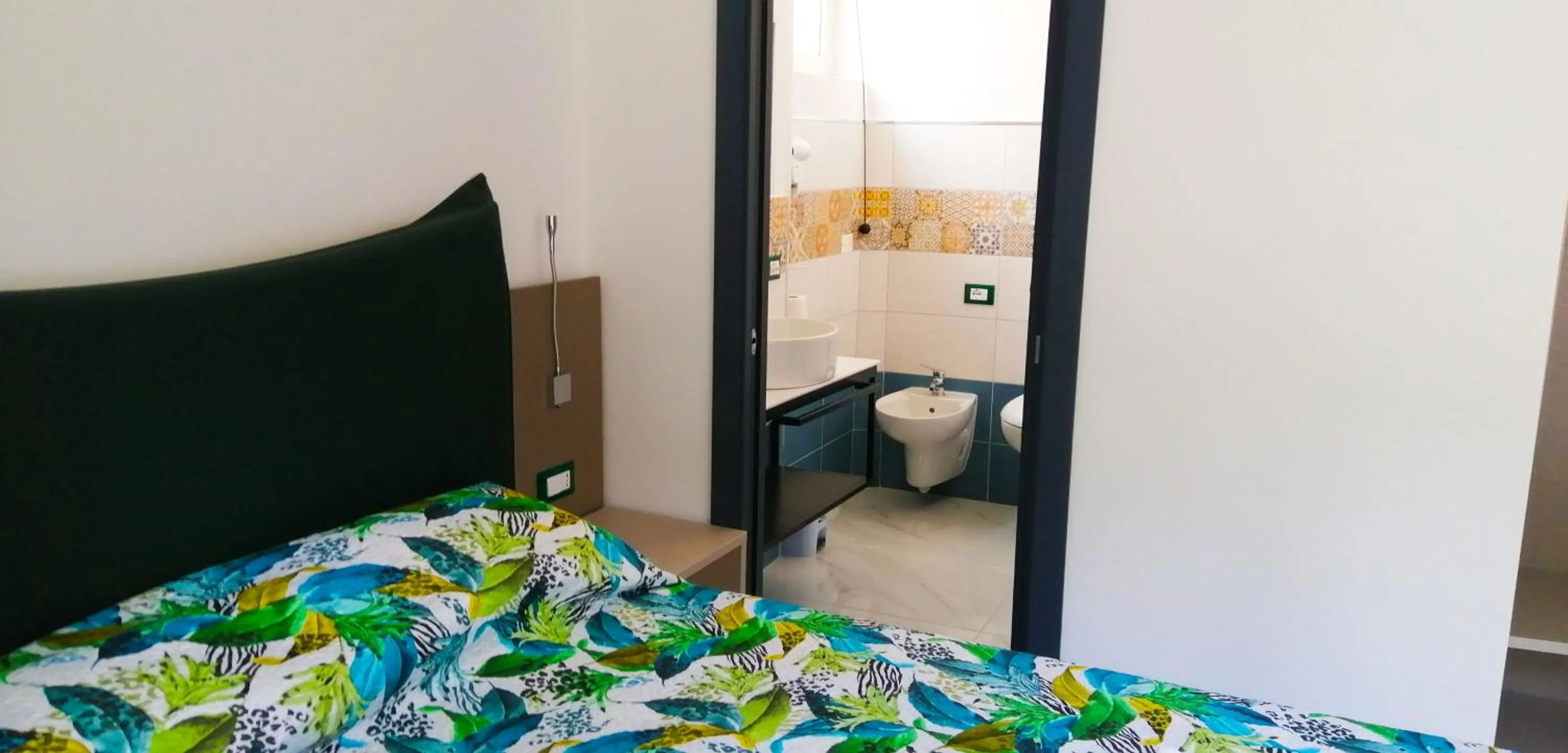 Bed in HOTEL HOUSE GARGANO