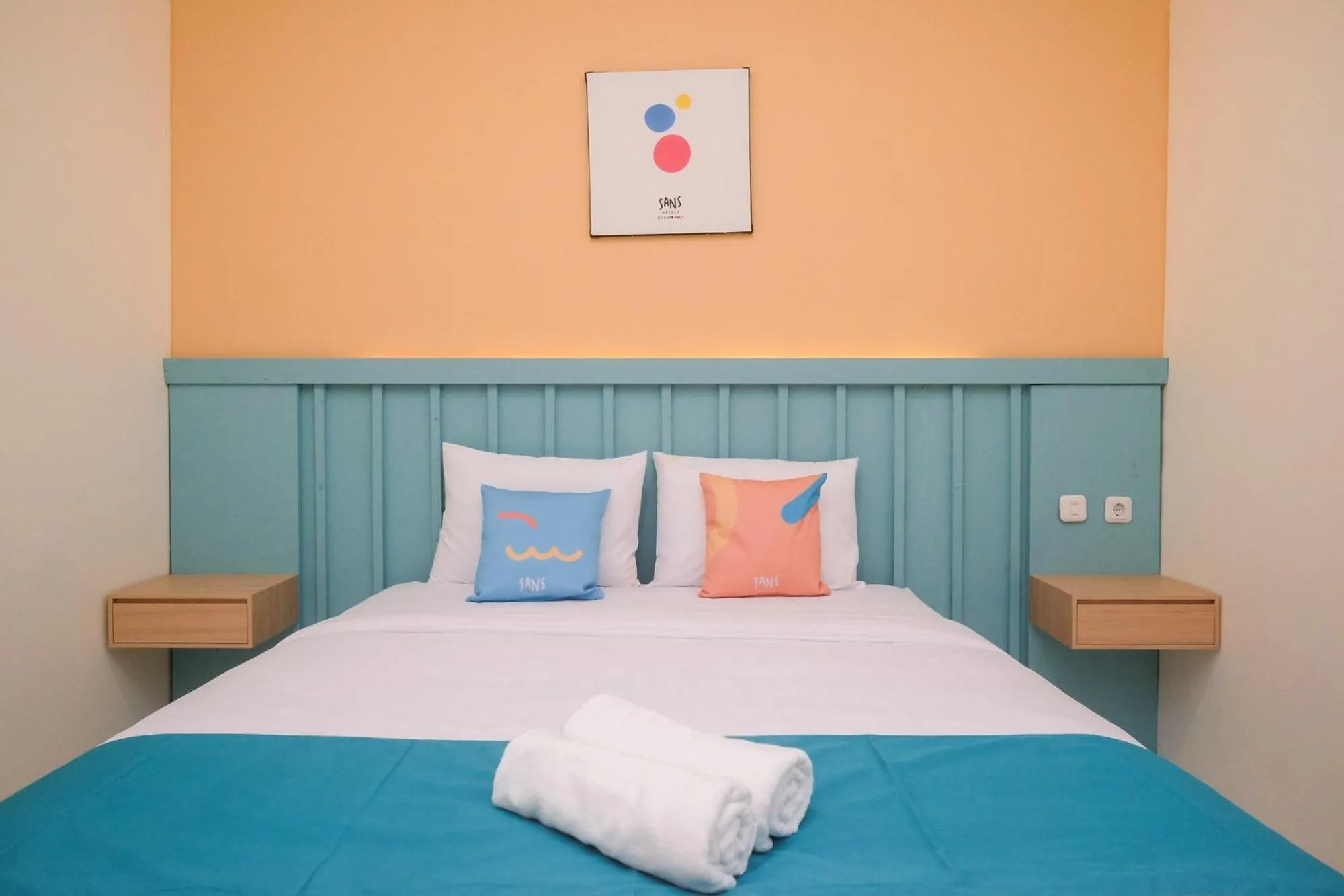 Bed in Sans Hotel City Inn Solo by RedDoorz