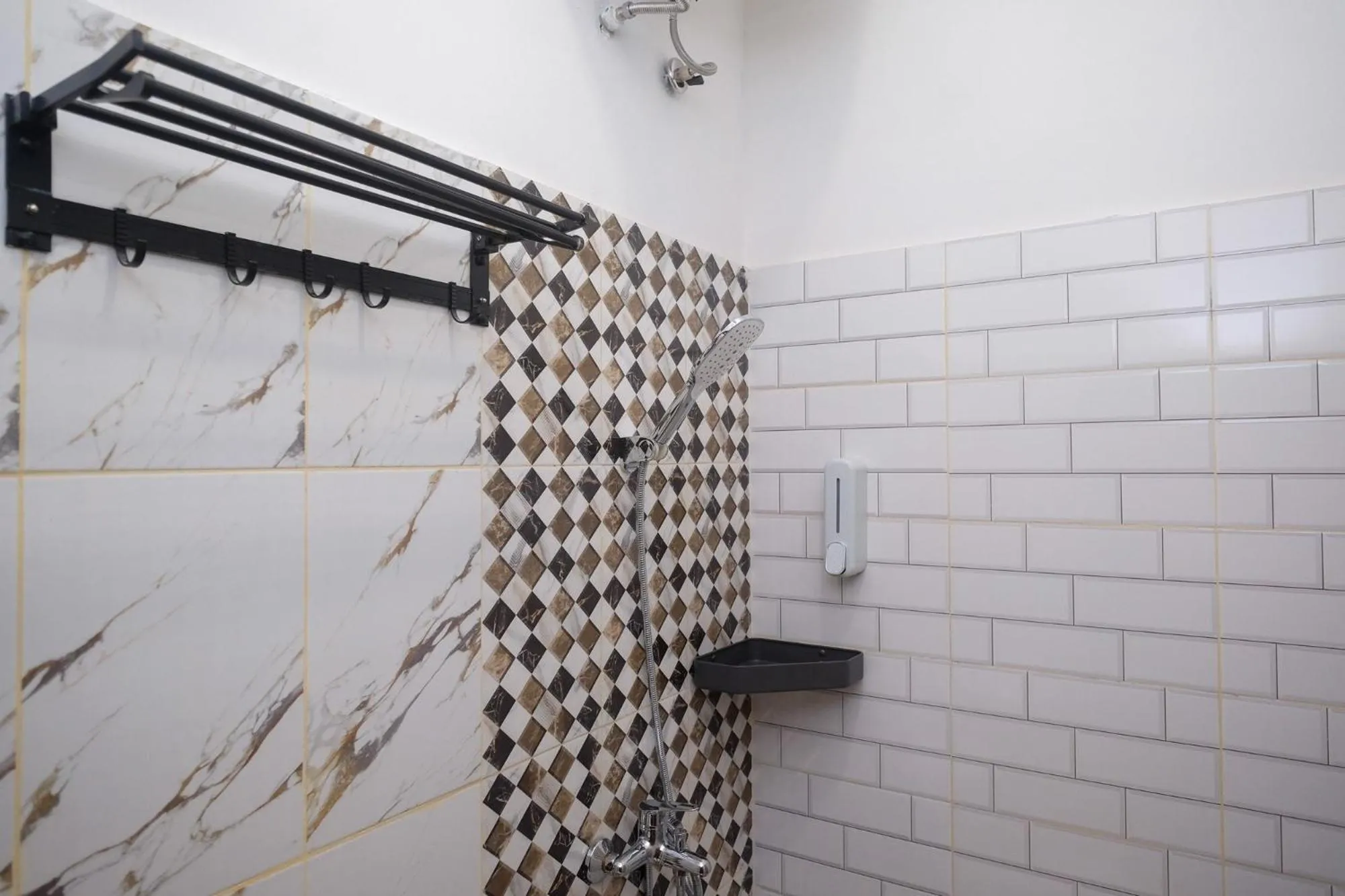 Shower in Sans Hotel City Inn Solo by RedDoorz