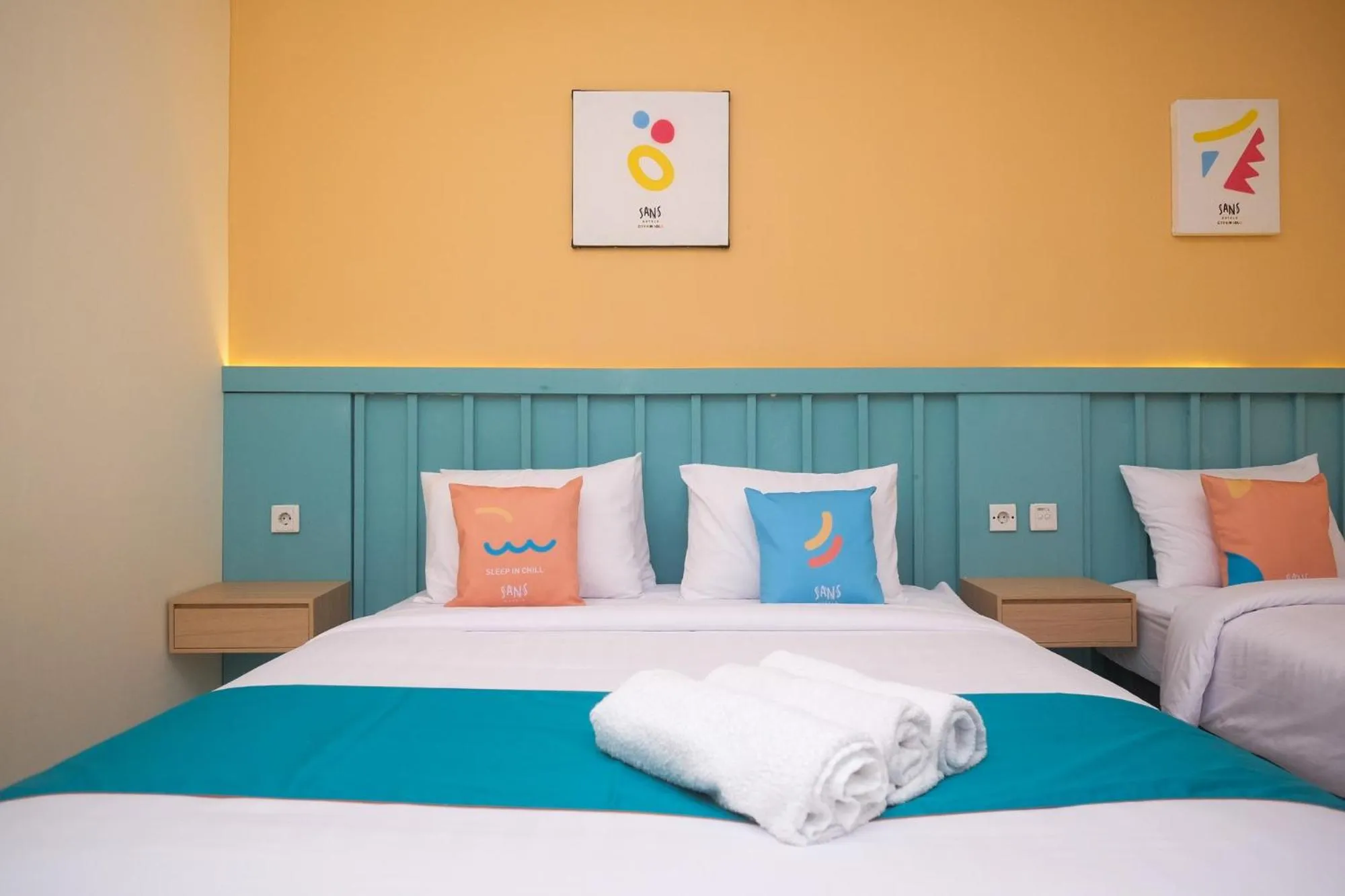 Bed in Sans Hotel City Inn Solo by RedDoorz