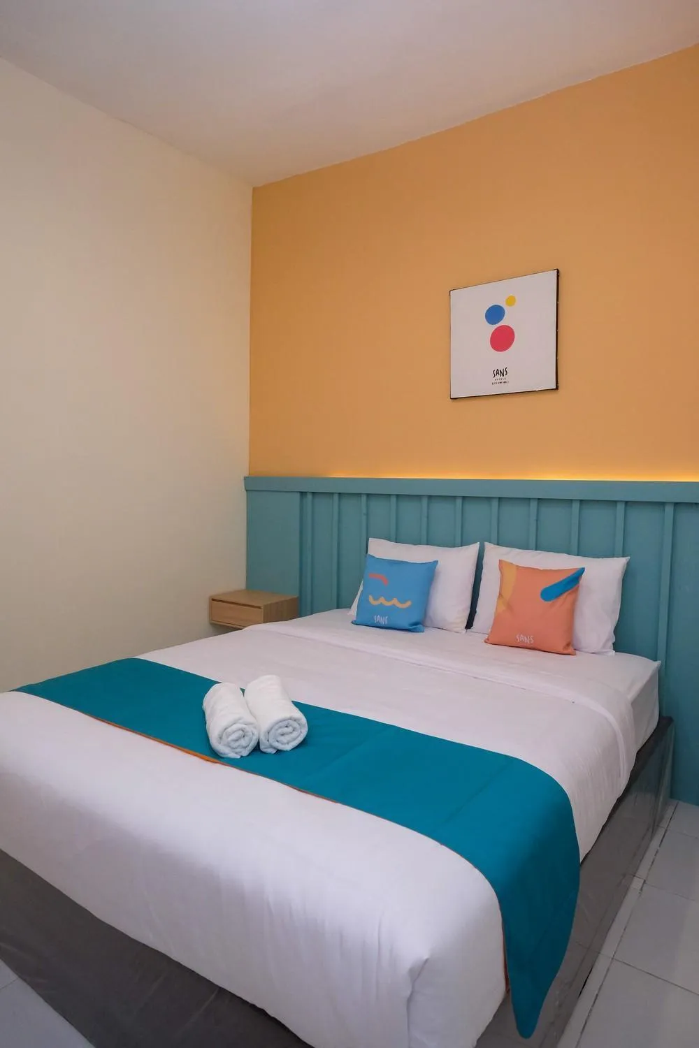 Bed in Sans Hotel City Inn Solo by RedDoorz