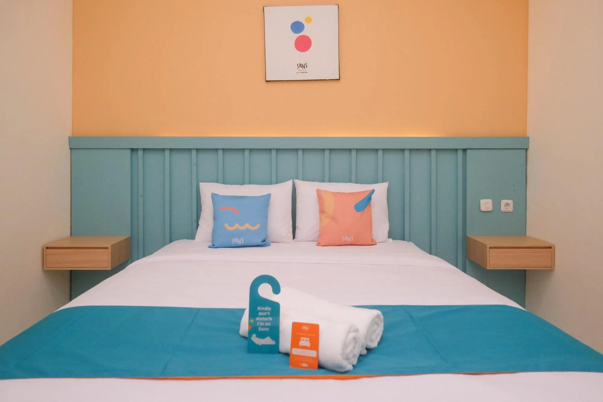 Bed in Sans Hotel City Inn Solo by RedDoorz