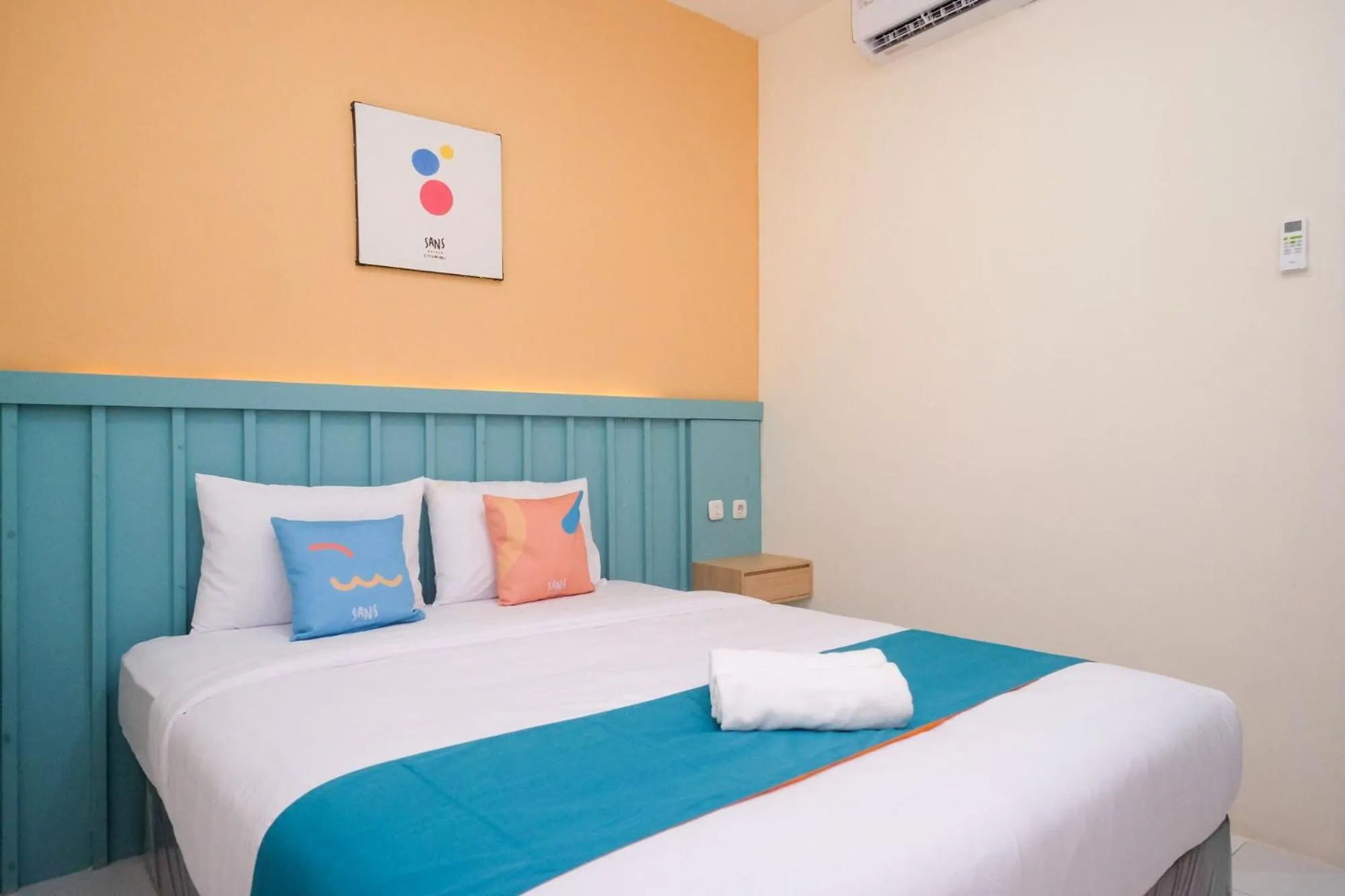 Bed in Sans Hotel City Inn Solo by RedDoorz