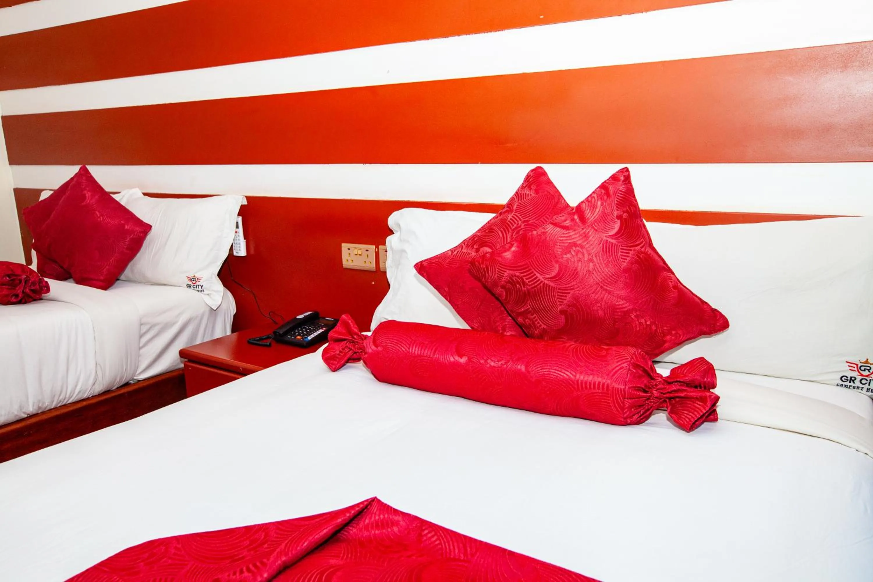 Bed in GR Comfort Hotel