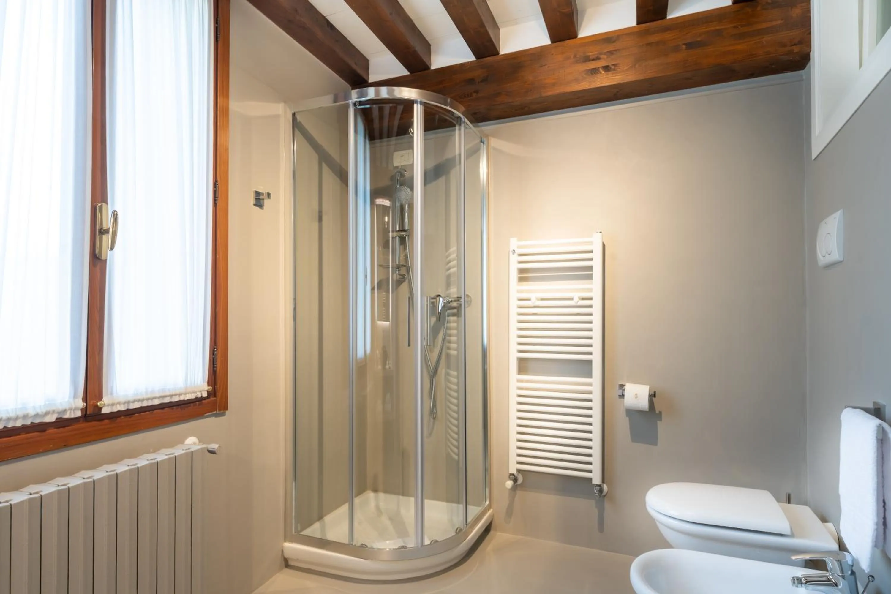 Shower in San Vio Palace Luxury Apartments