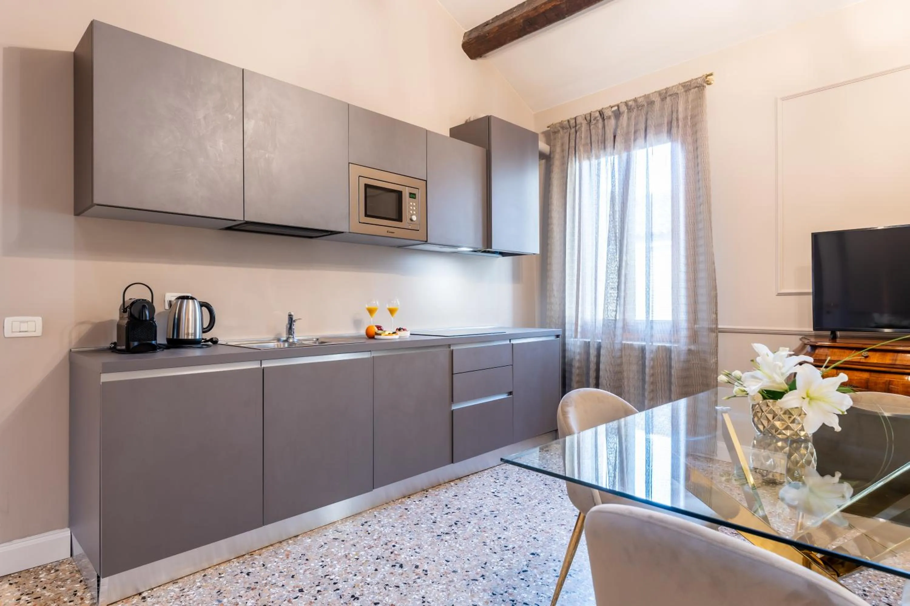 kitchen in San Vio Palace Luxury Apartments