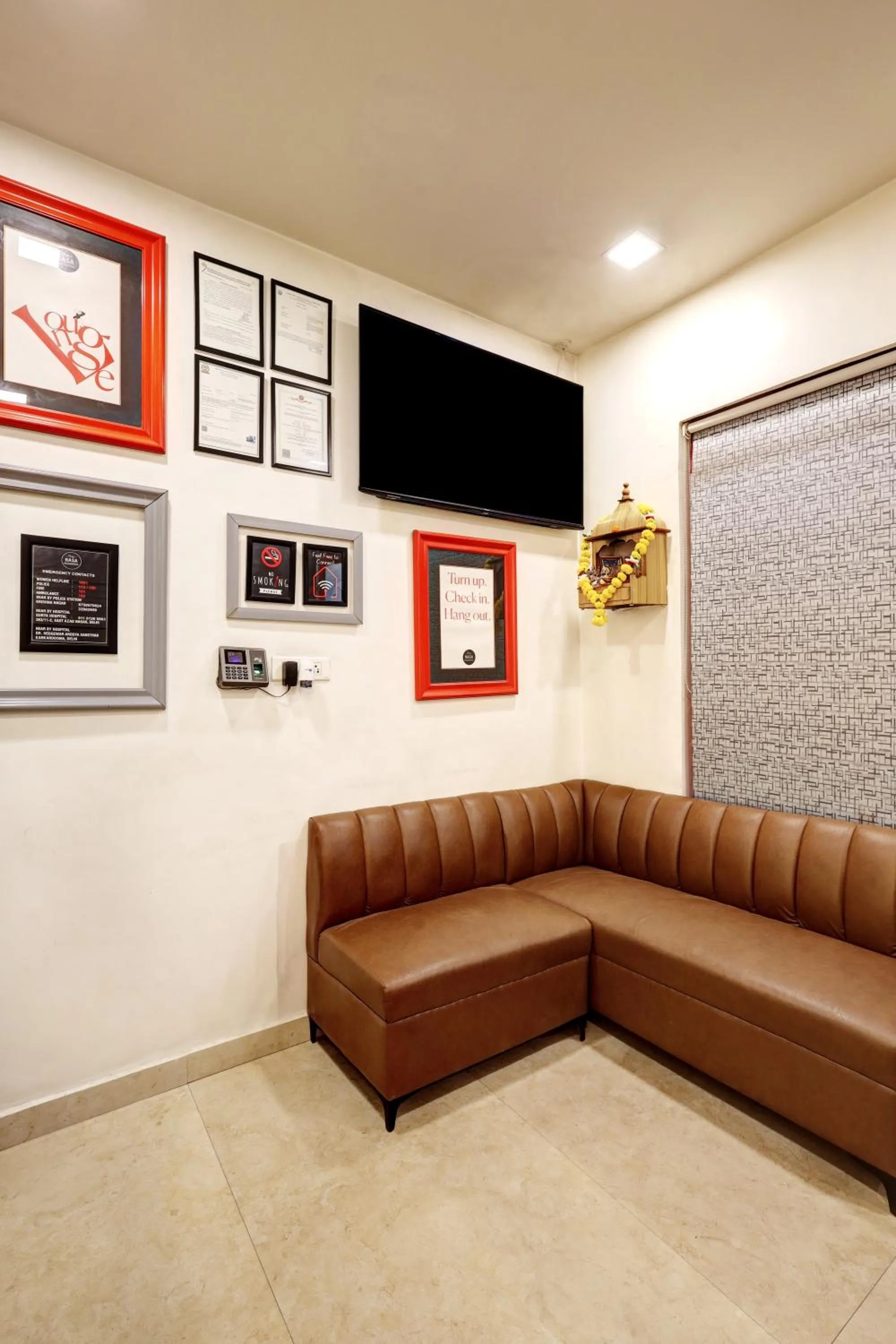 TV and multimedia in Hotel The Rasa Near Welcome Metro Station