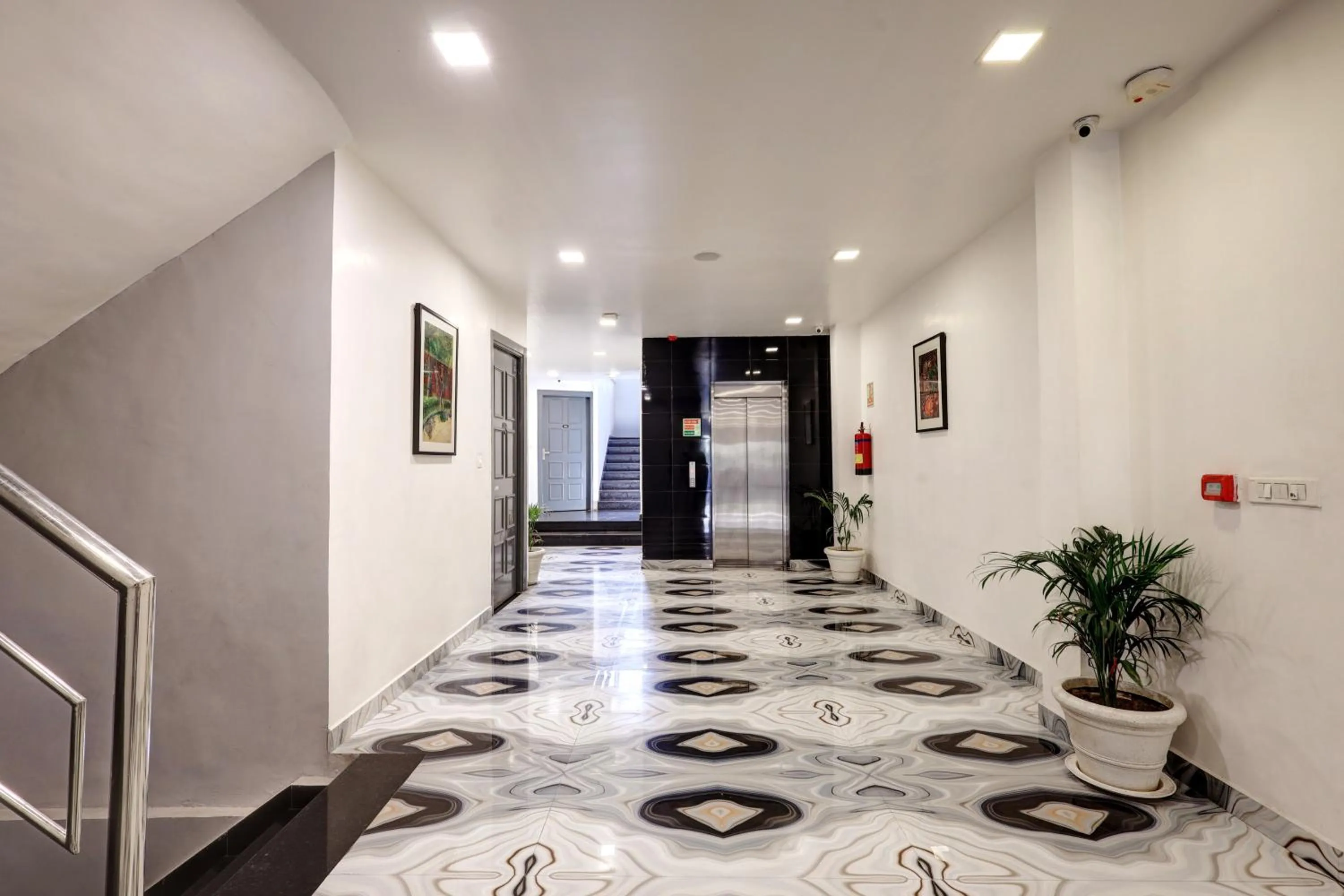 elevator in Hotel The Rasa Near Welcome Metro Station