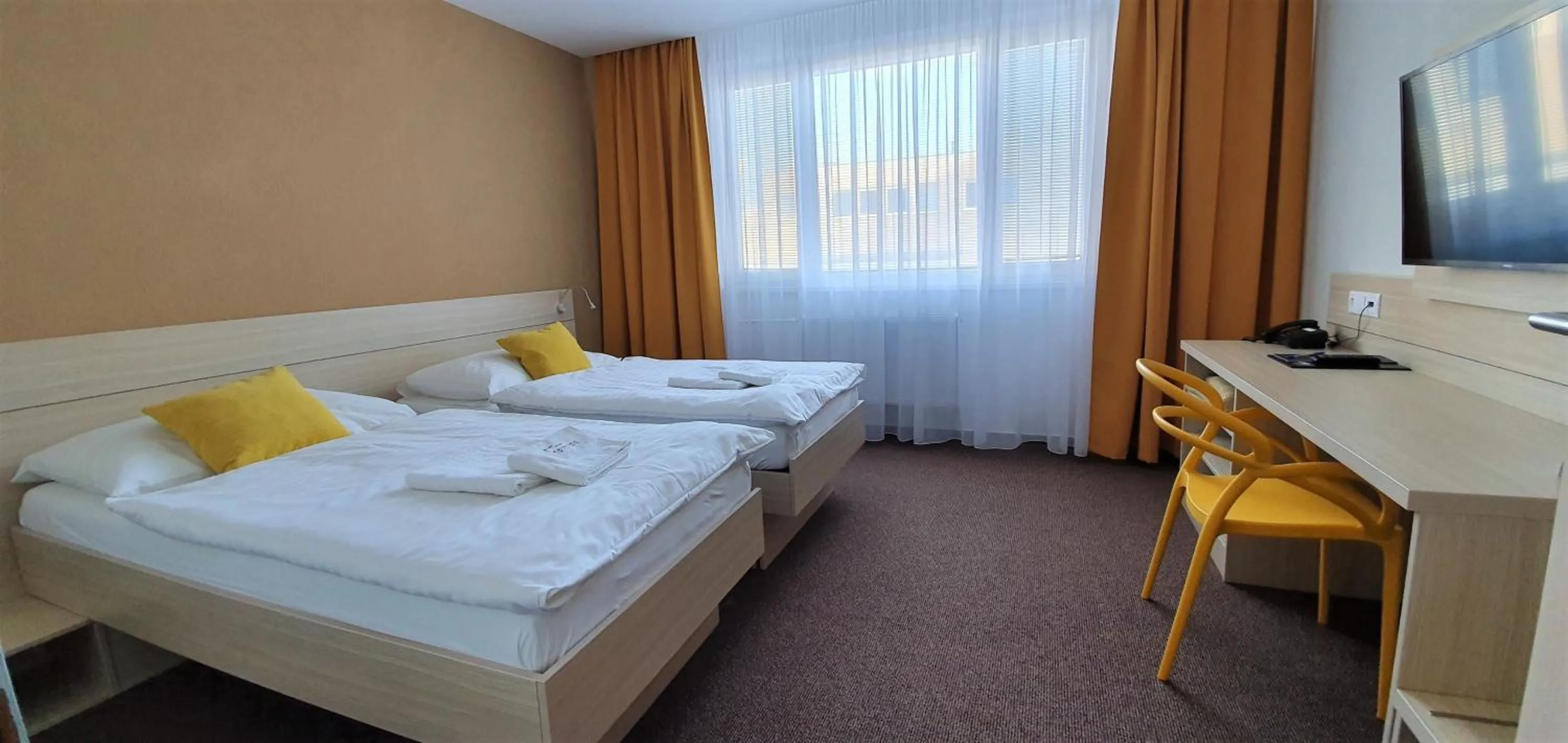 TV and multimedia, Bed in Hotel Kristína